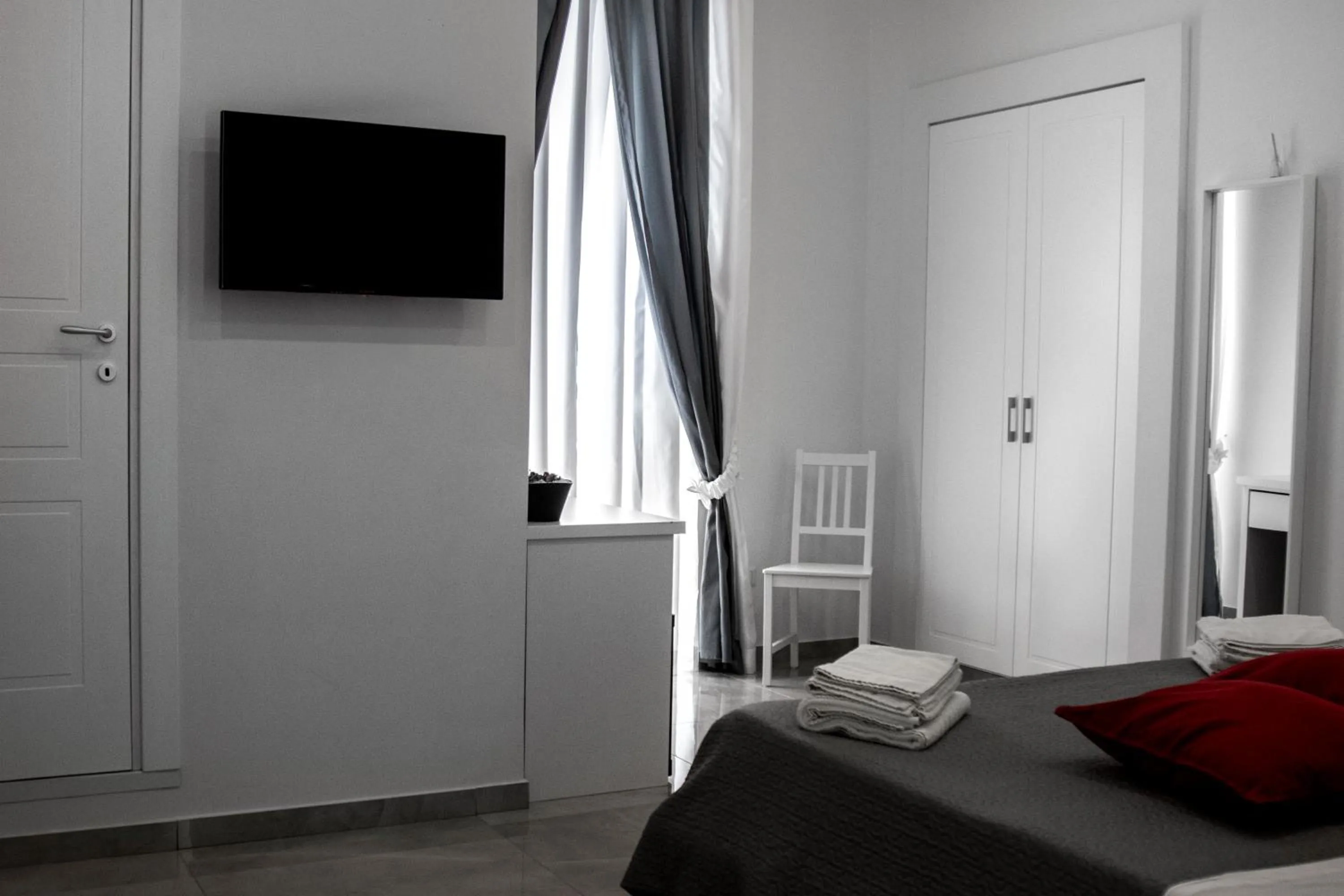 Bed in Aurora Luxury Rooms