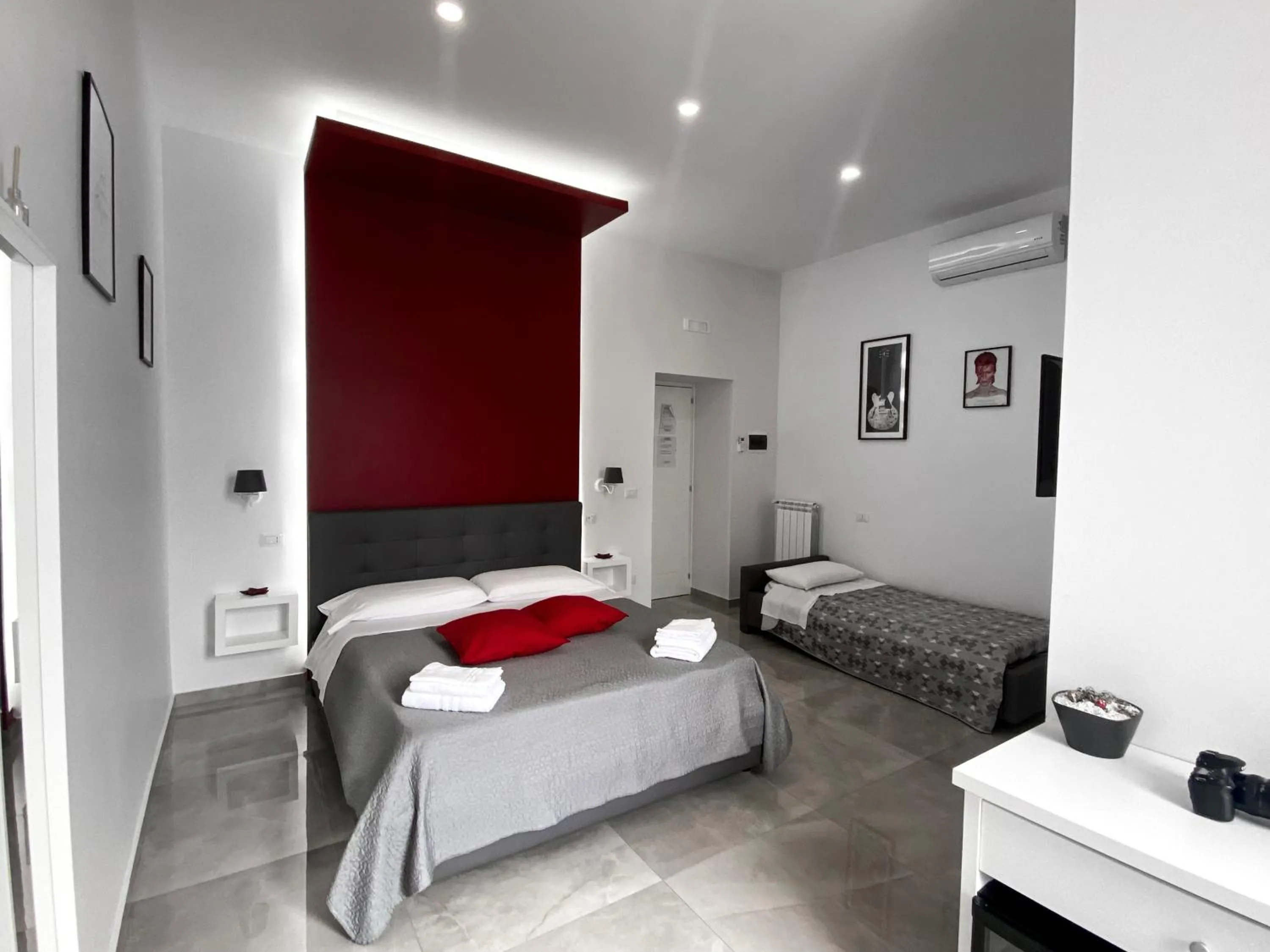 Bed in Aurora Luxury Rooms