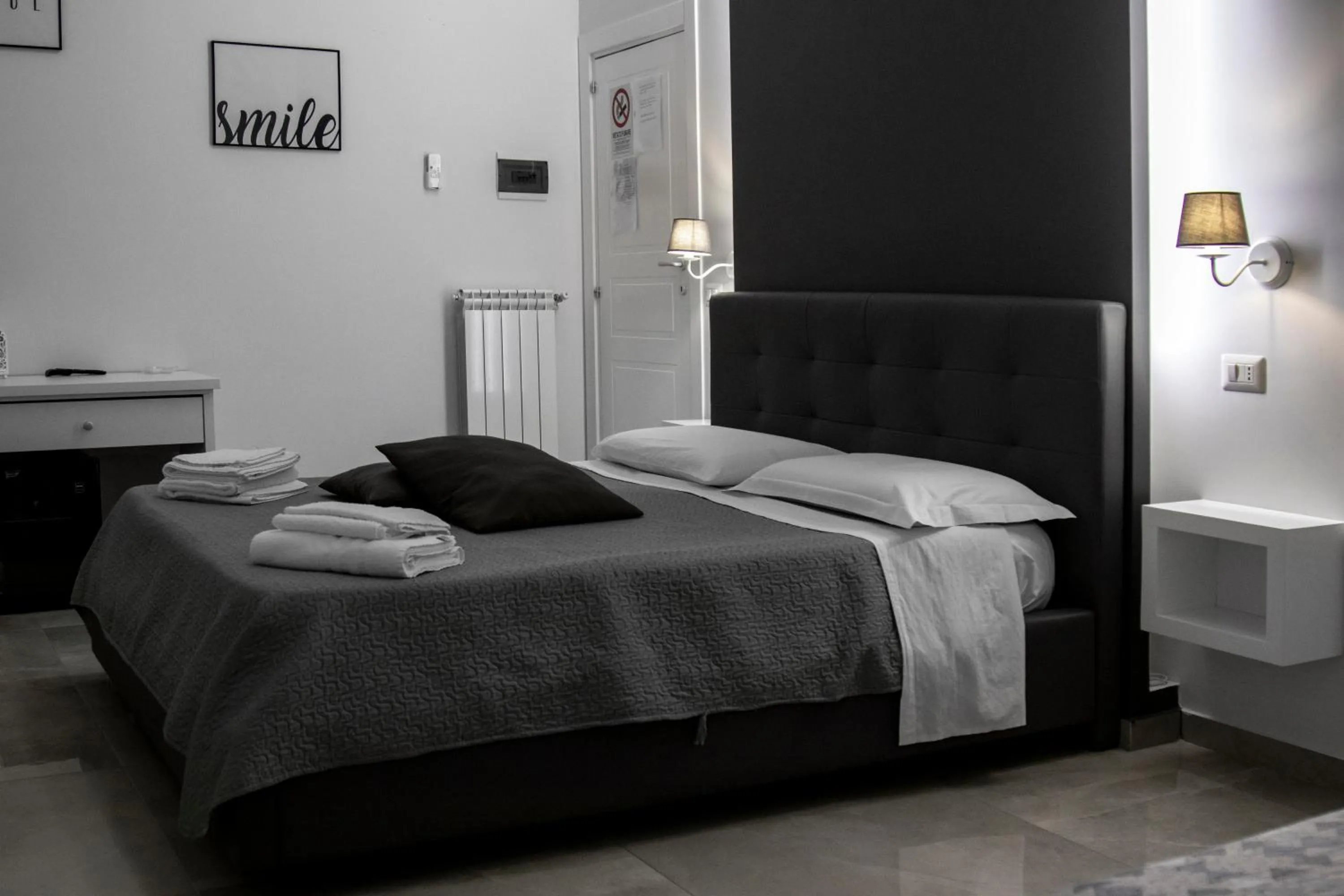 Bed in Aurora Luxury Rooms