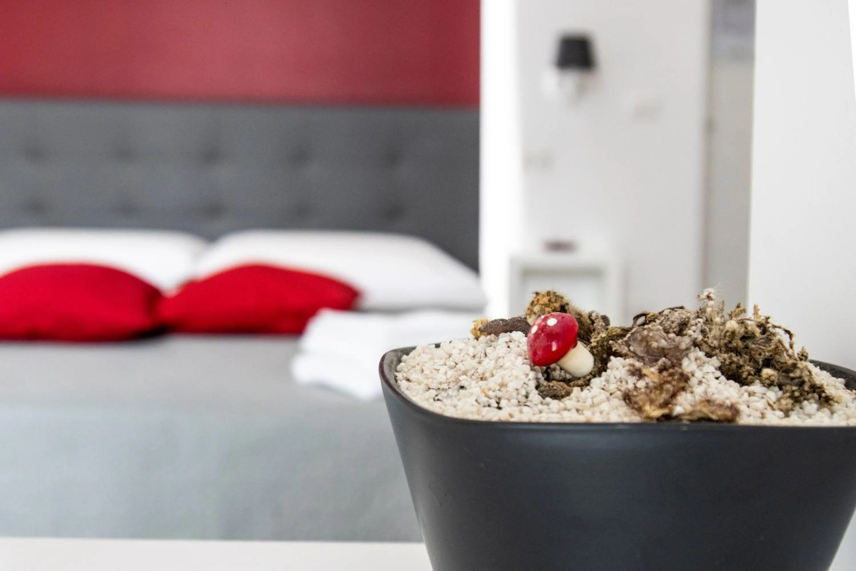 Bed in Aurora Luxury Rooms