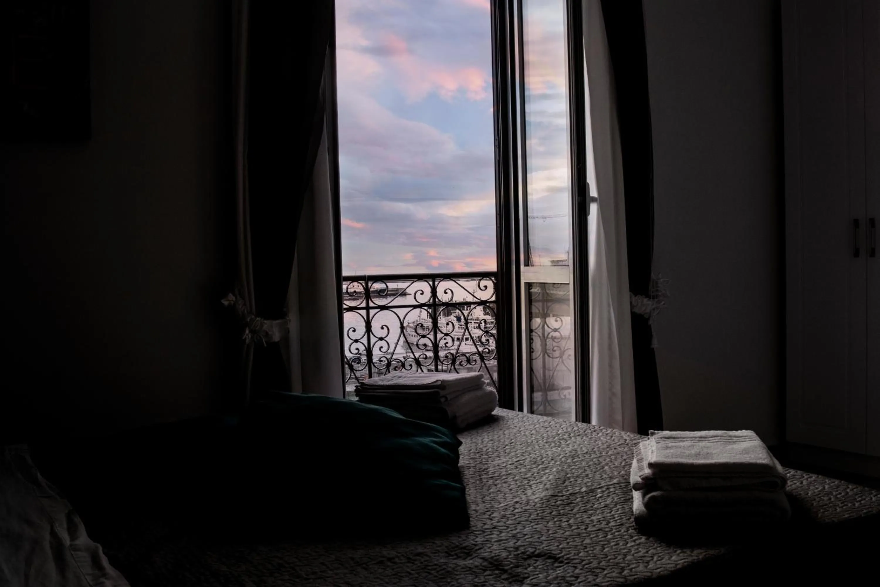 Bed in Aurora Luxury Rooms