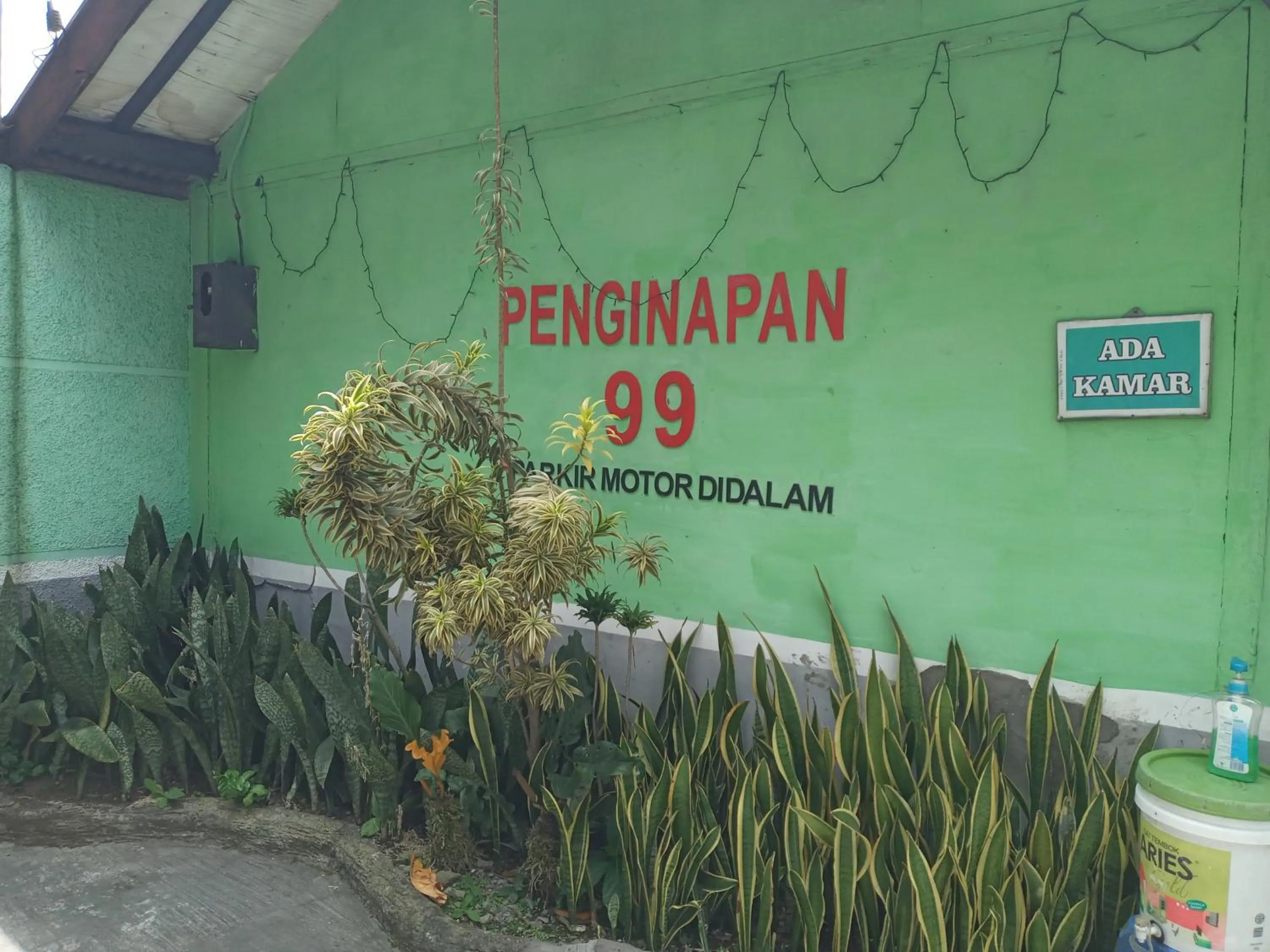 Property logo or sign in Penginapan 99