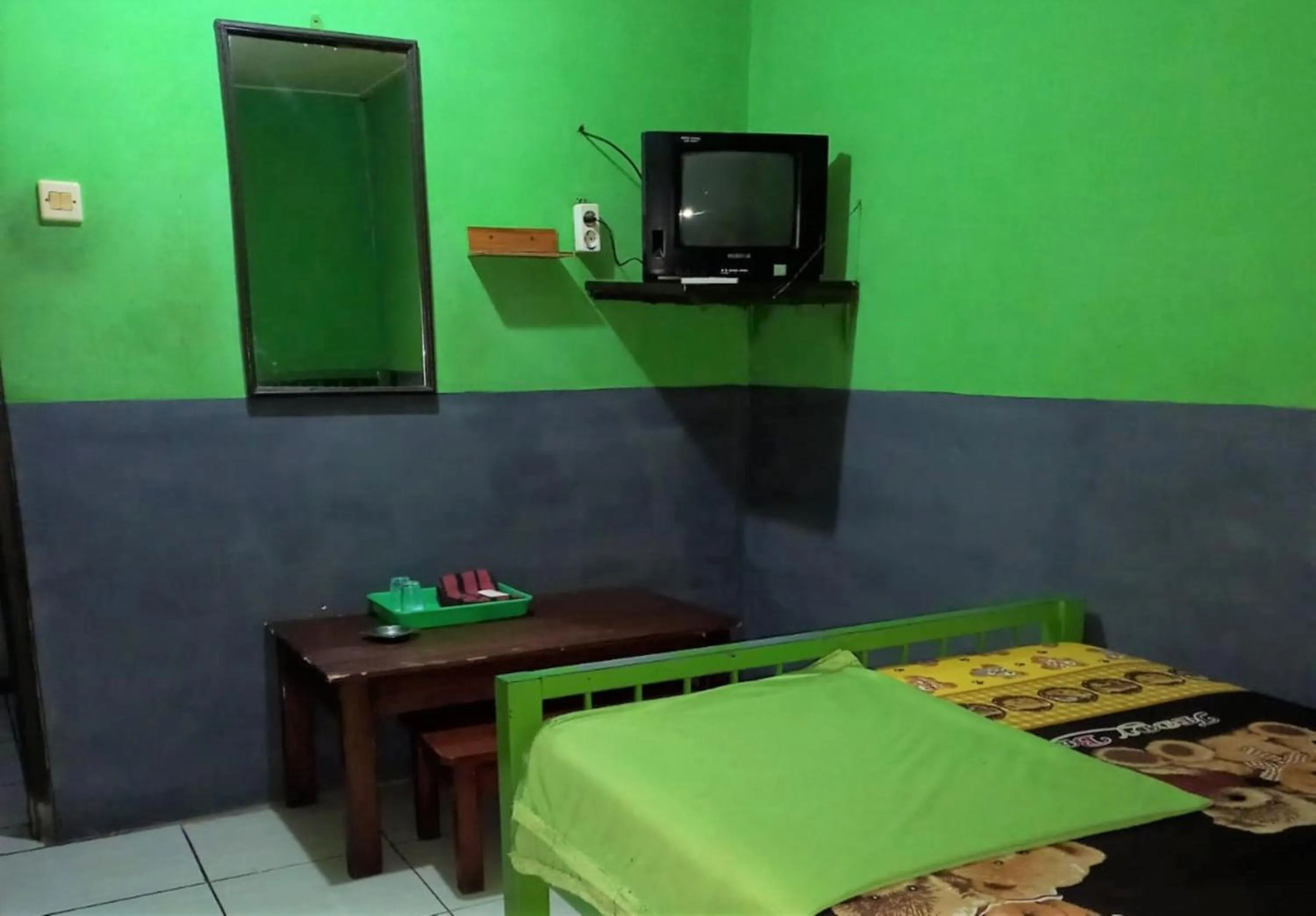 Bedroom in Penginapan 99