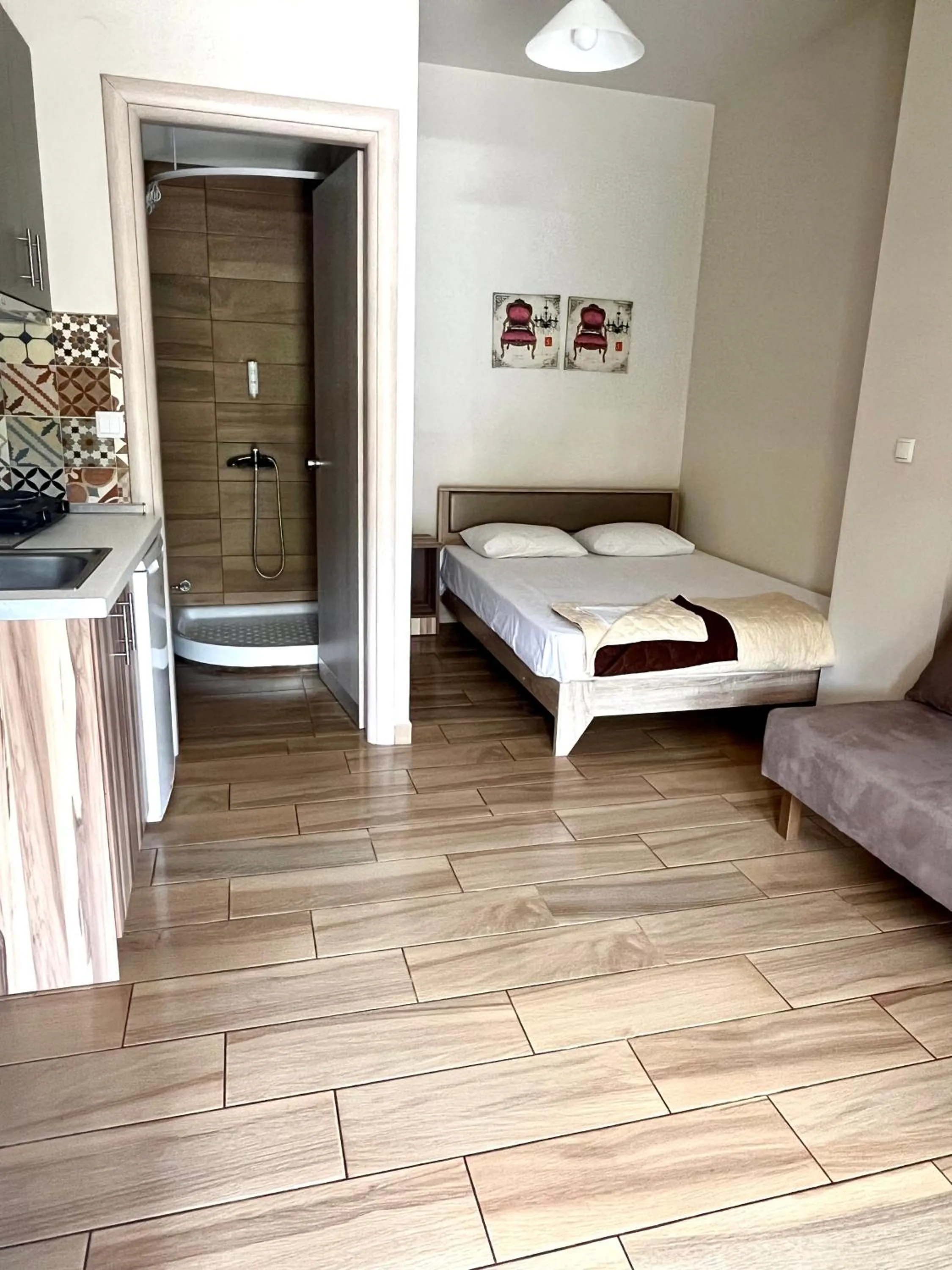 Bed in Soso studios & apartments