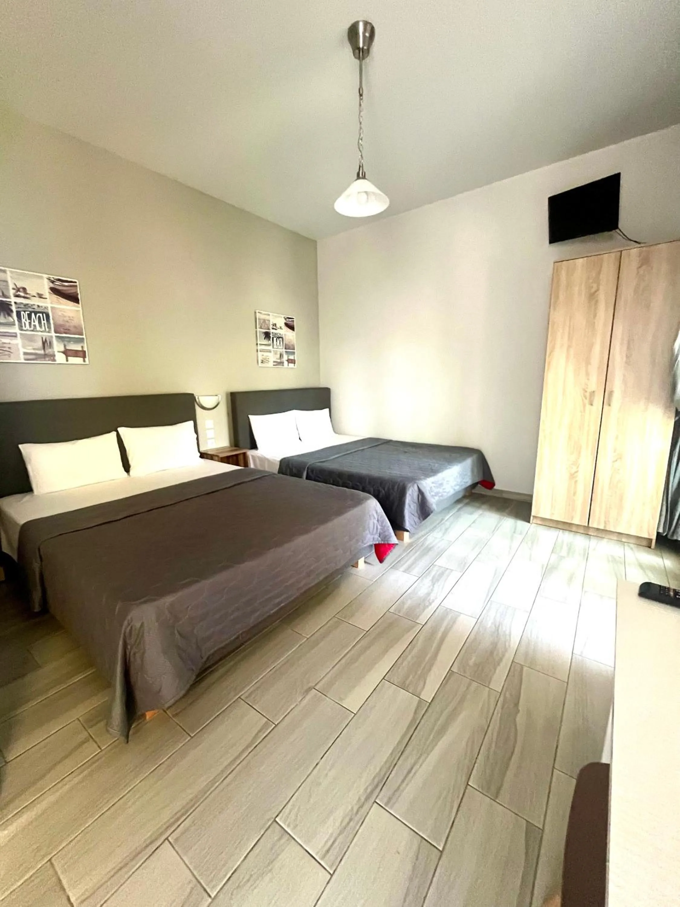 Bed in Soso studios & apartments