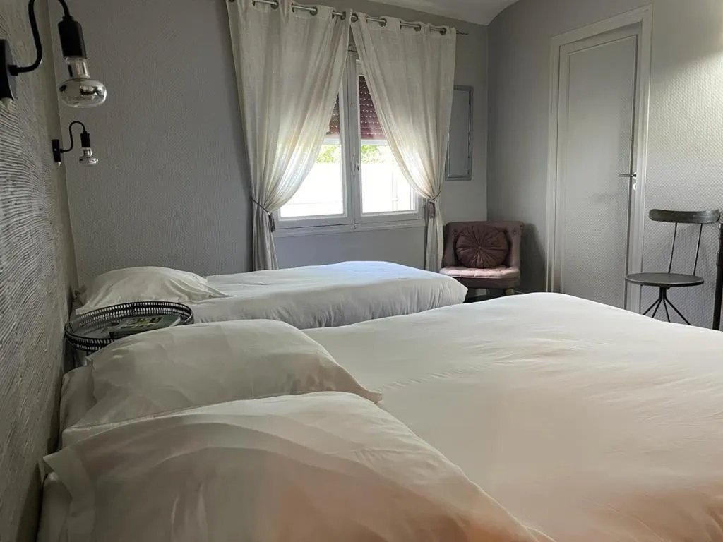 Bed in Hotel du Commerce