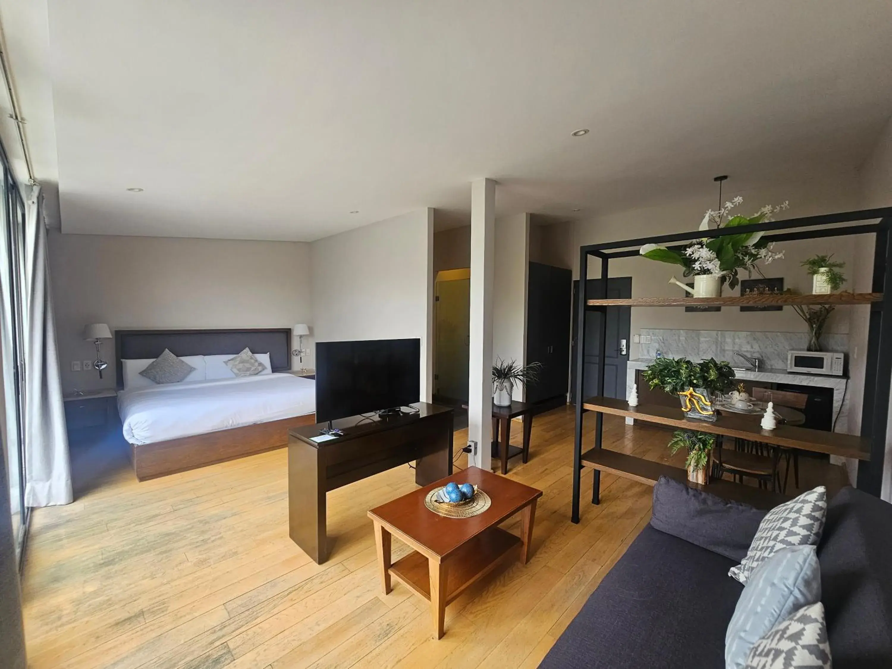 Communal lounge/ TV room, Bed in Close To You By Residence L´Heritage BlueBay Communal lounge/ TV room, Bed in Close To You By Residence L´Heritage BlueBay