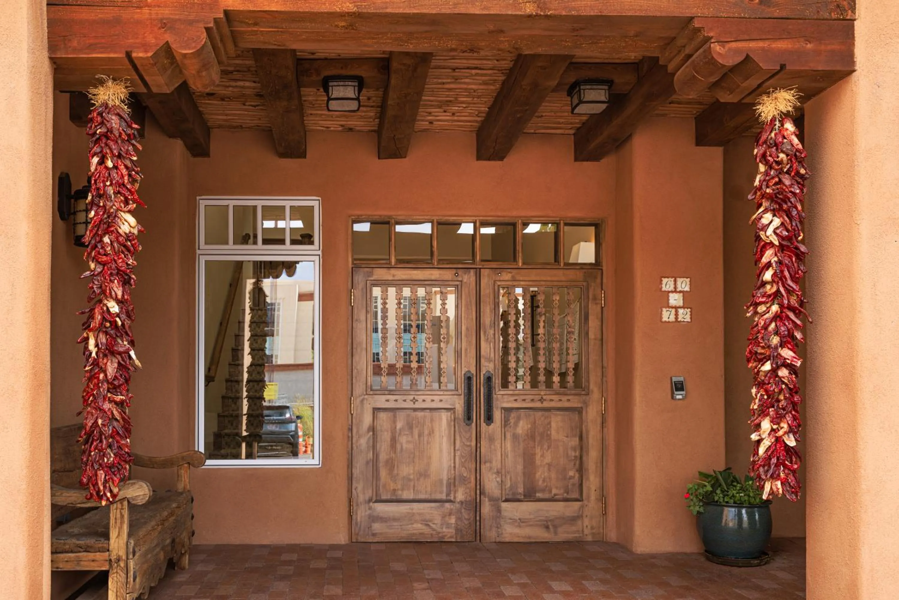 Facade/entrance in Piñon Court by La Fonda