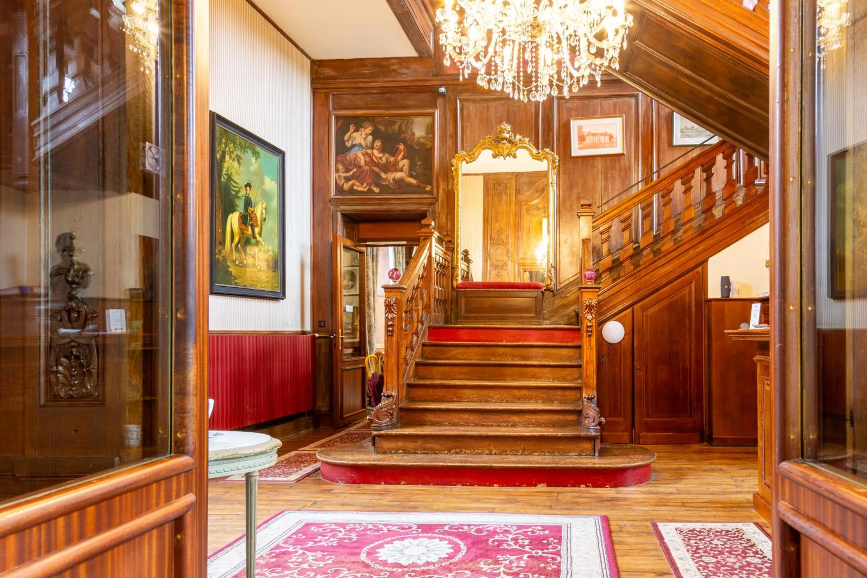Lobby or reception in Château Hôtel Du Colombier