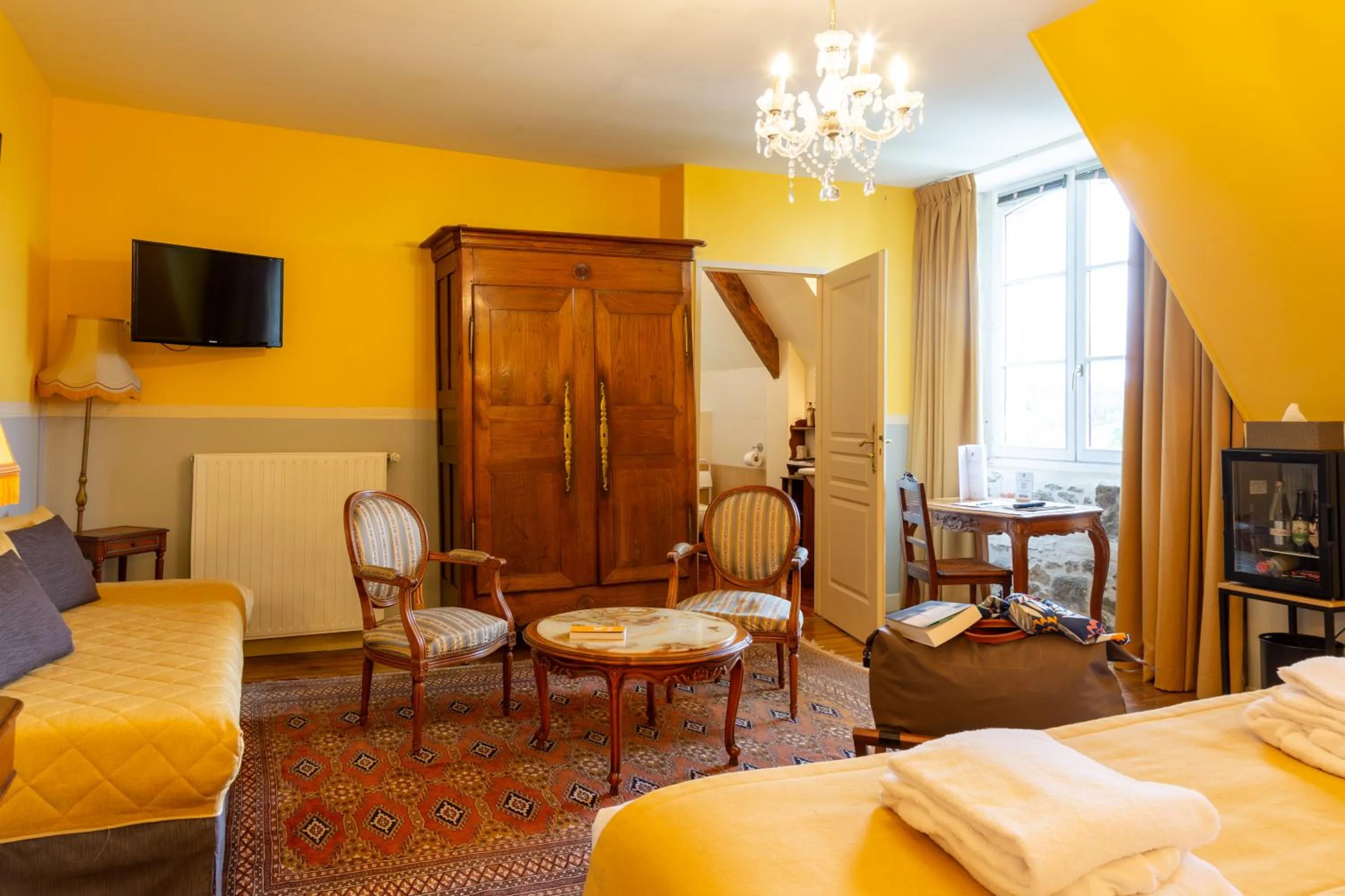 Bed in Château Hôtel Du Colombier