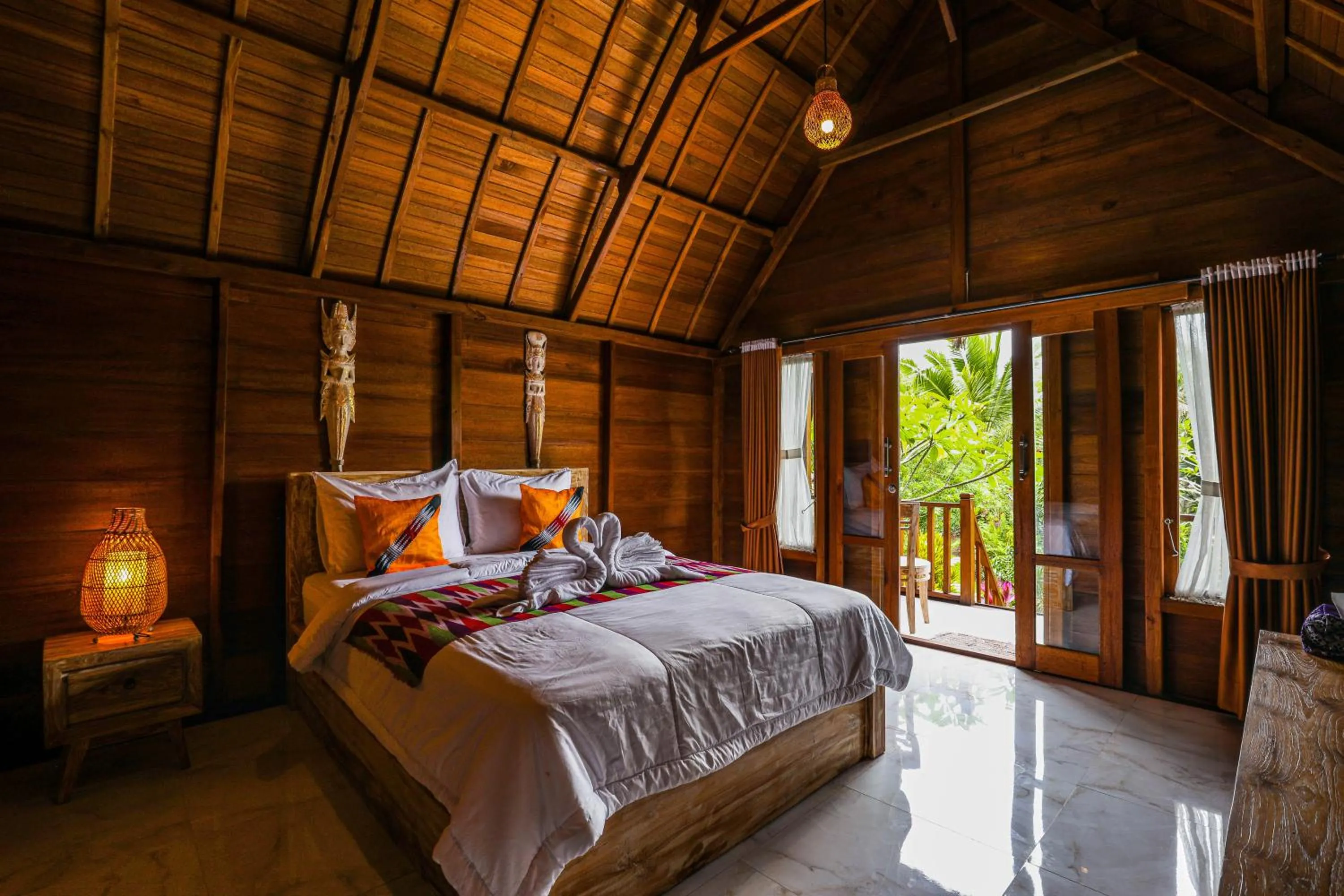 Bed in The Tukad Gepuh Cottage and Resto