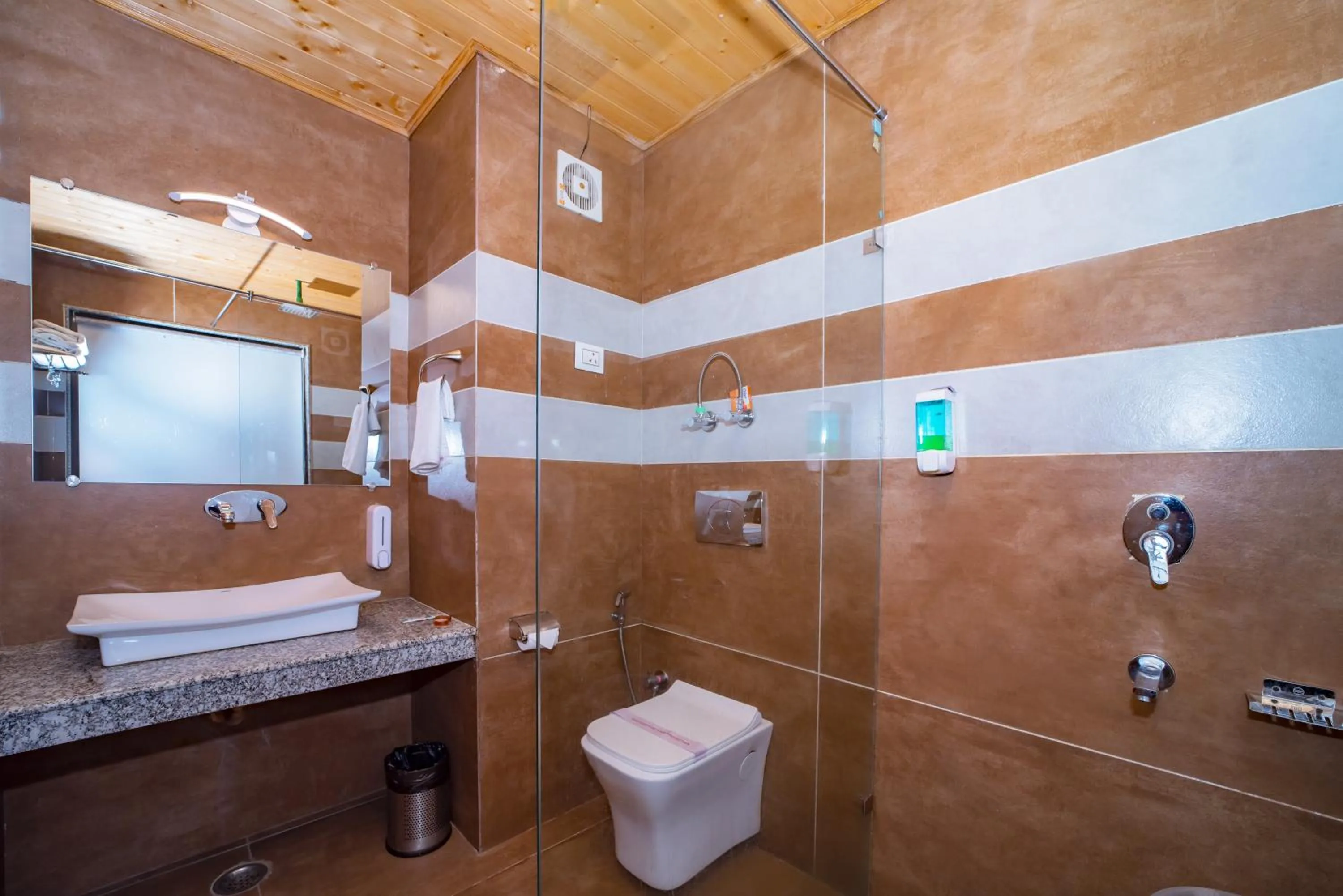 Shower in Snow City's Montana Blues Resort Manali - Heated & Air-Cooled Stay