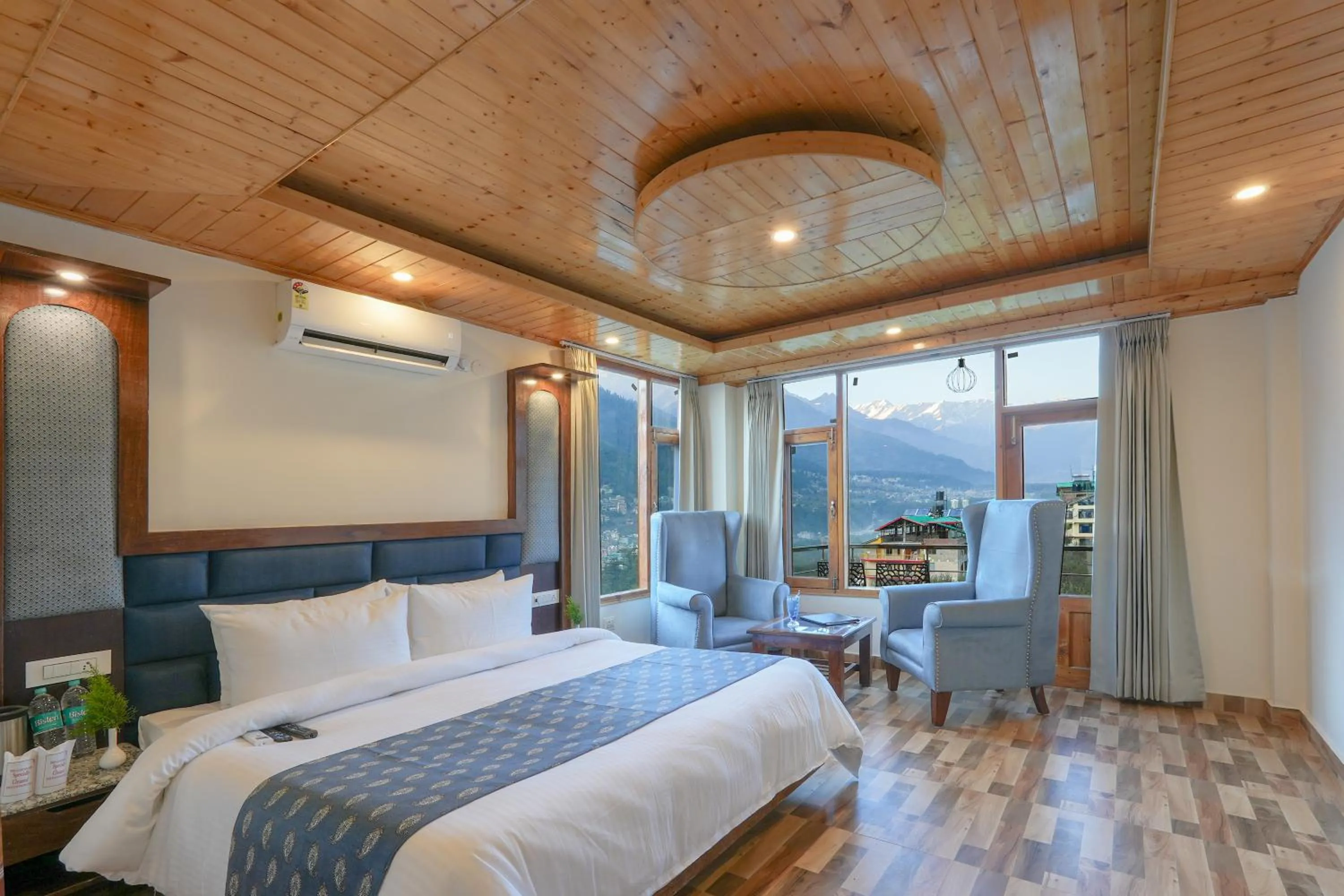 Bed in Snow City's Montana Blues Resort Manali - Heated & Air-Cooled Stay