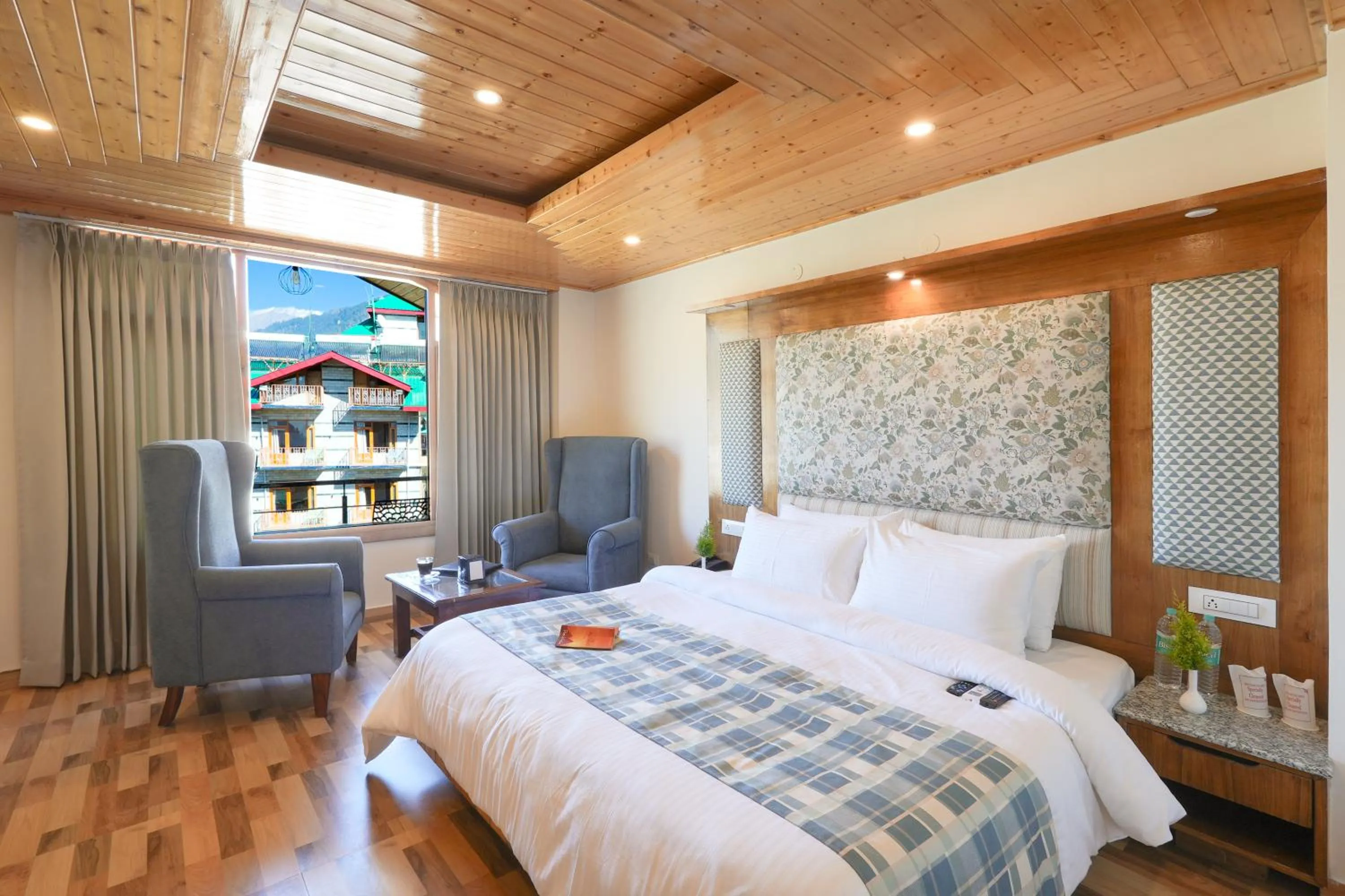 Bed in Snow City's Montana Blues Resort Manali - Heated & Air-Cooled Stay