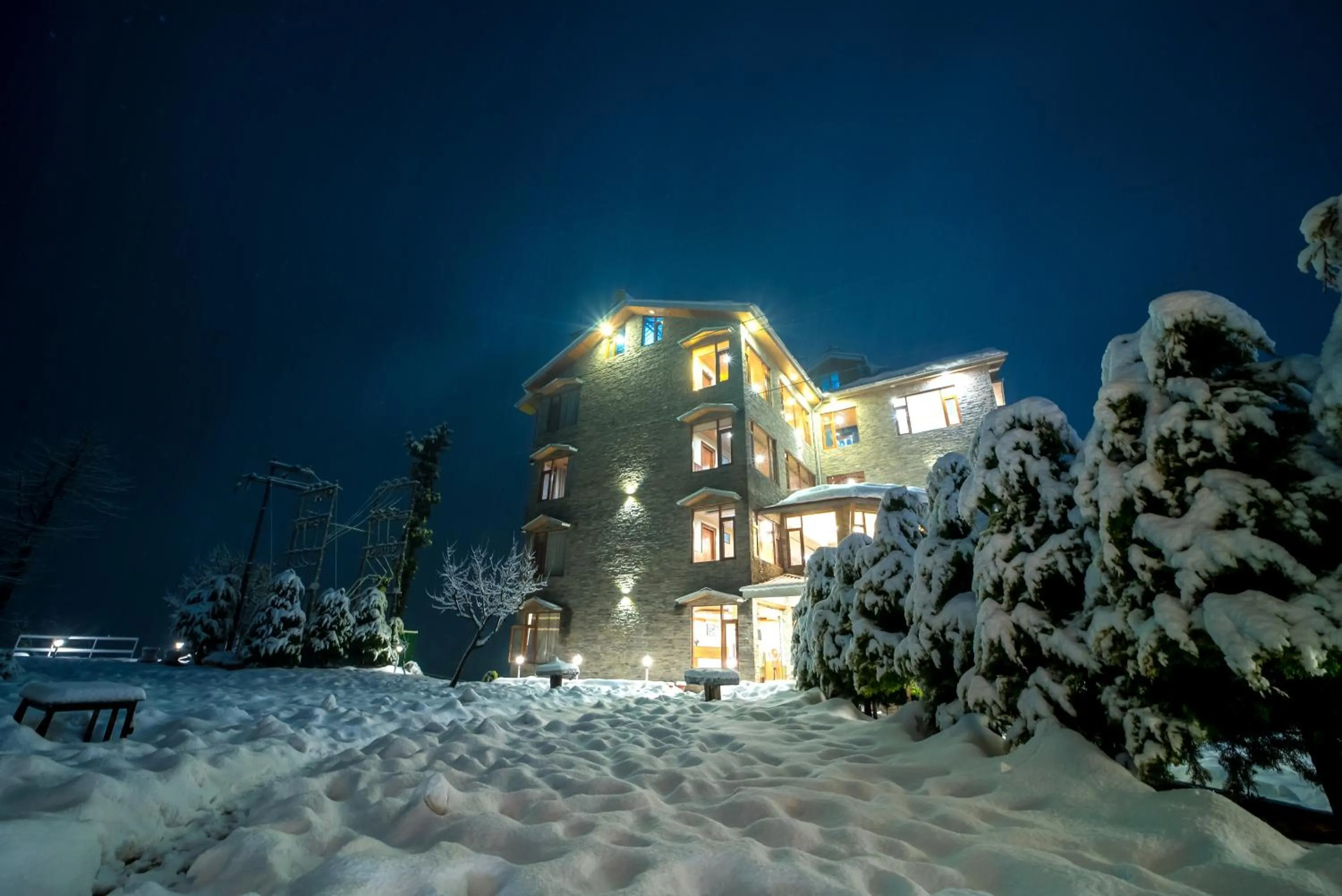 Property building in Snow City's Montana Blues Resort Manali - Heated & Air-Cooled Stay
