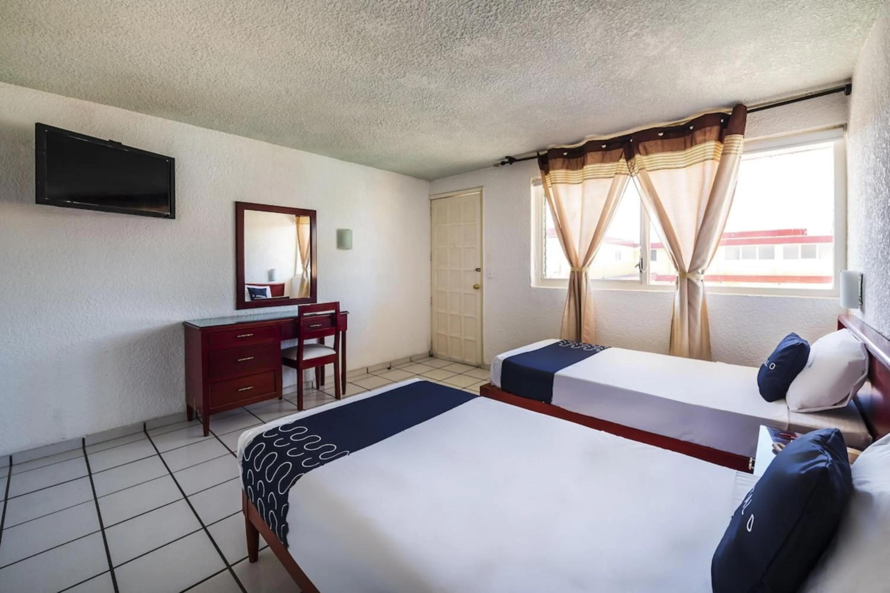 Bedroom, Bed in Capital O Colón, Ciudad Guzmán Jalisco