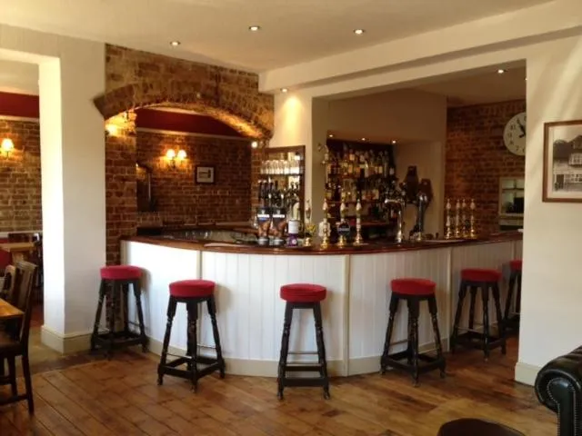 Lounge or bar in The Half Moon Inn