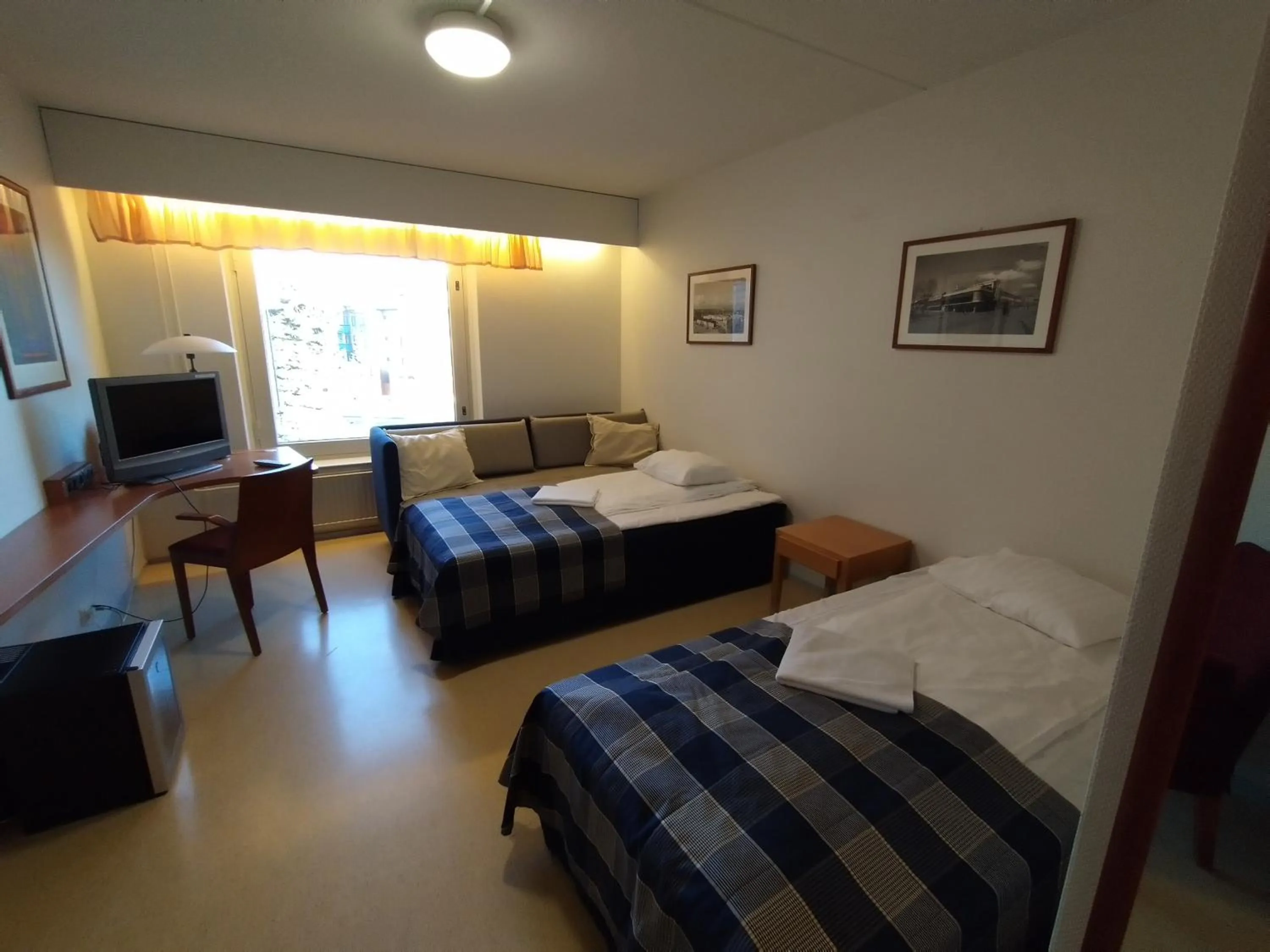 Bed in West Side Hotel