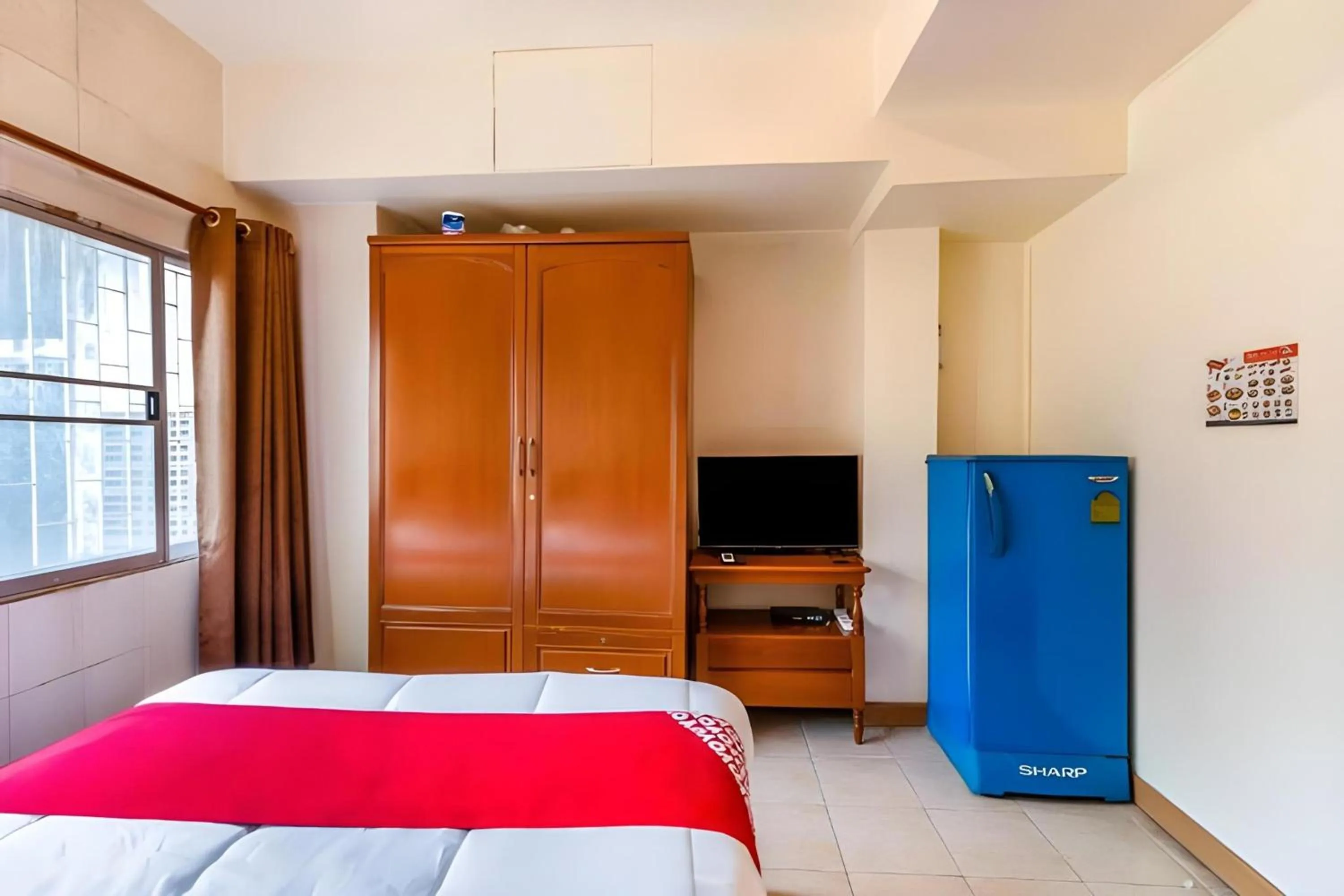 Bedroom, Bed in OYO 583 Sweethome Guest House