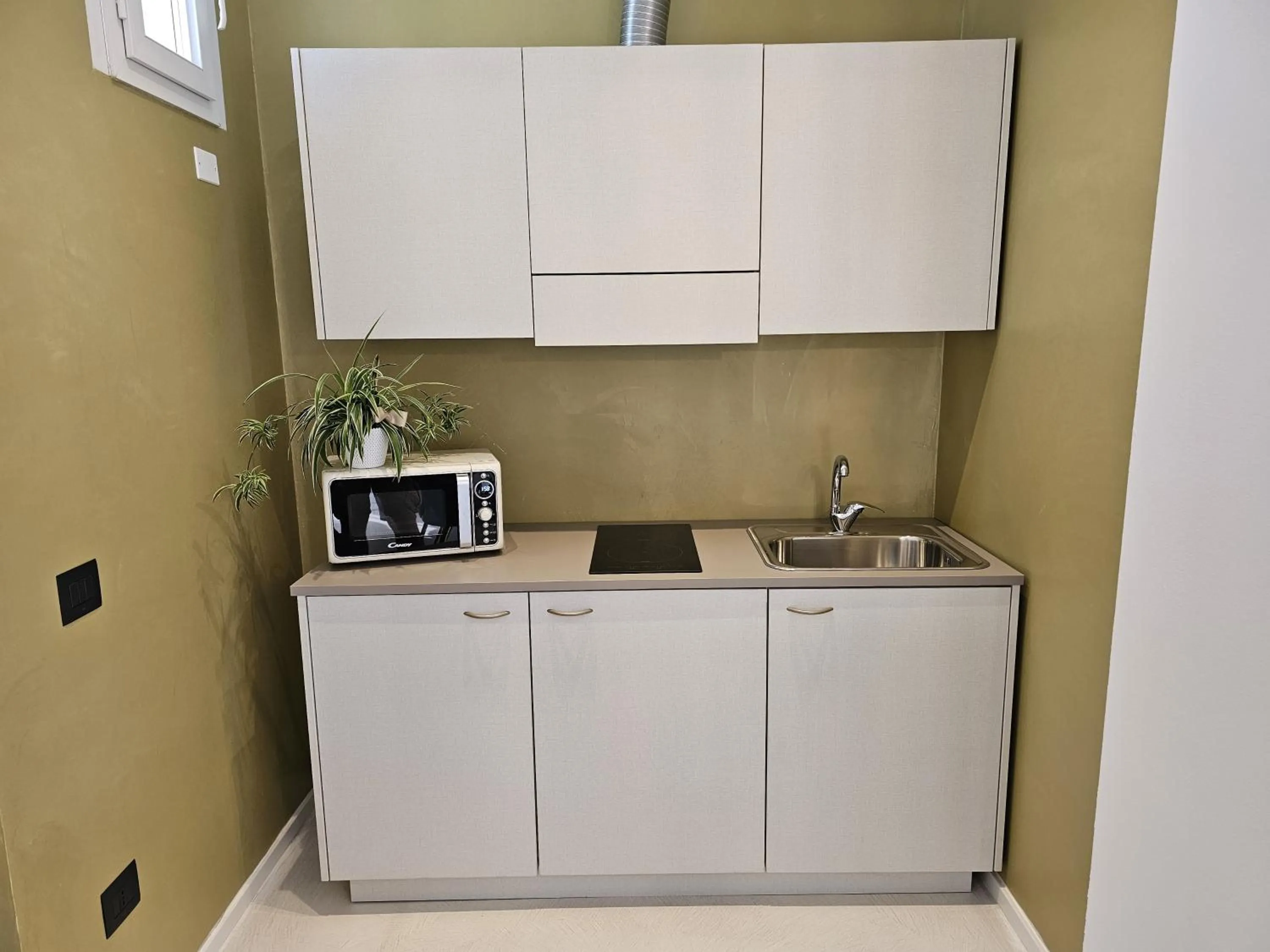 Kitchen or kitchenette in Gabbiano Suites