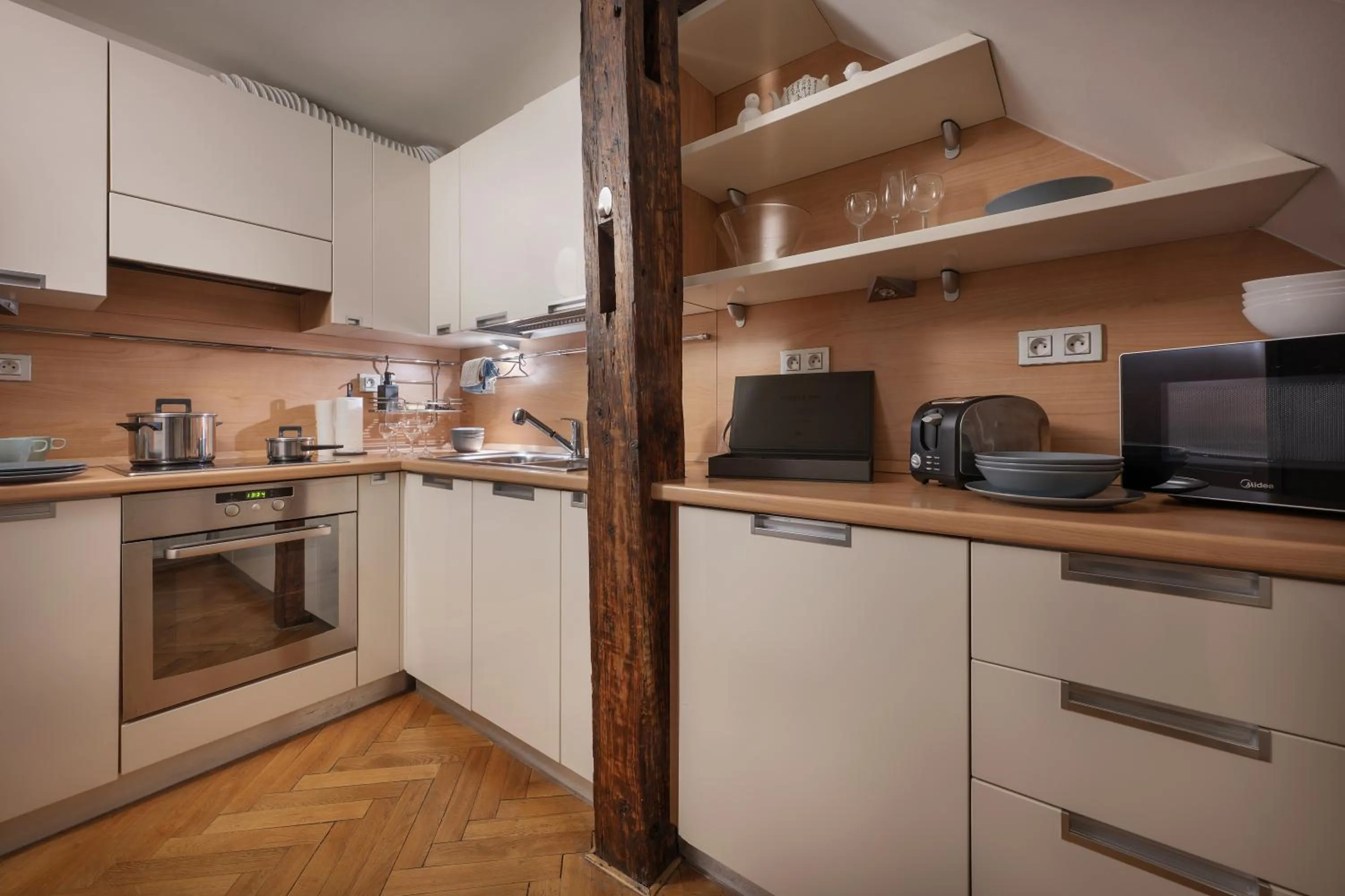 Kitchen or kitchenette in White Swan Boutique Apartments