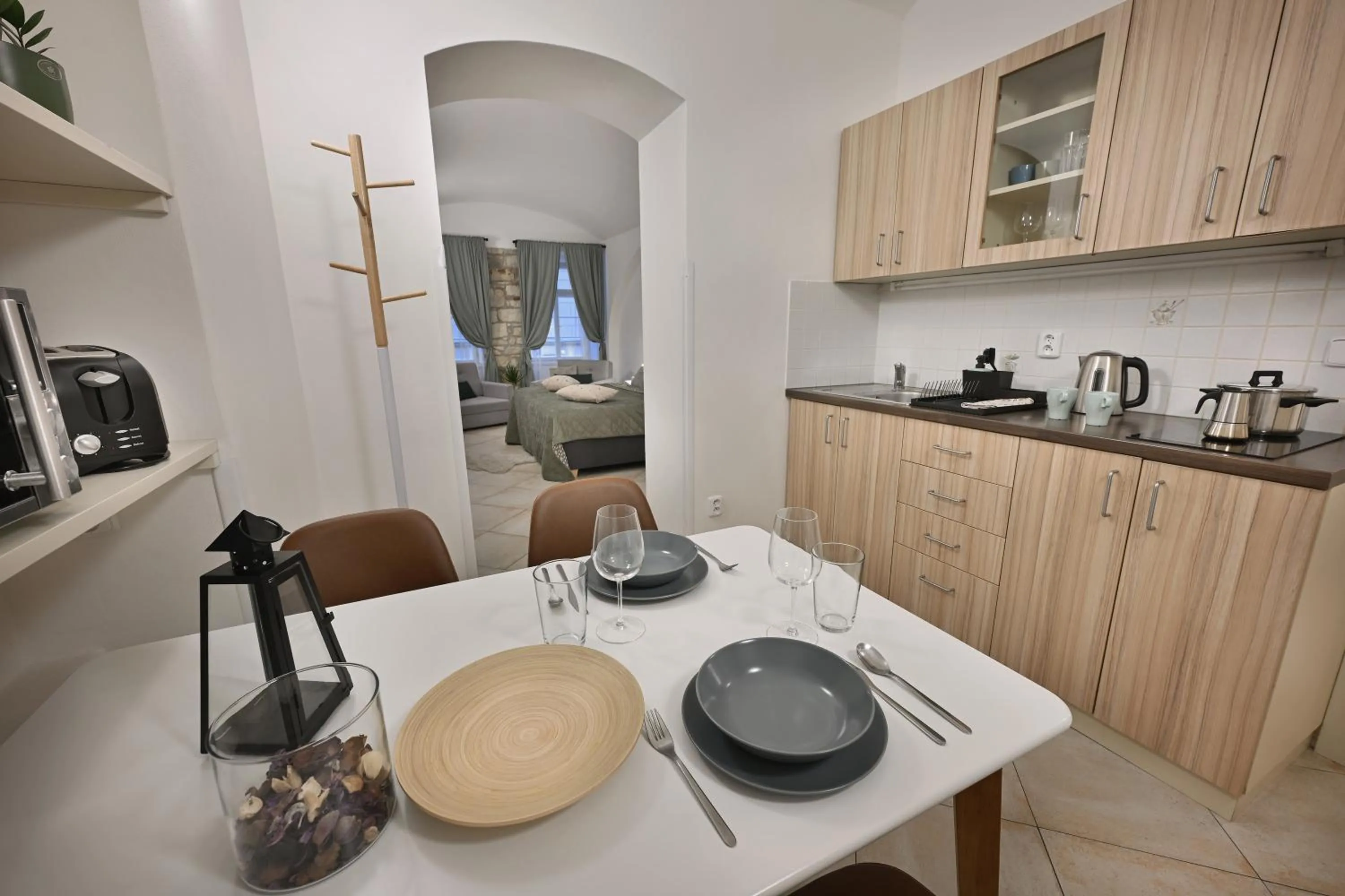 Kitchen or kitchenette in White Swan Boutique Apartments