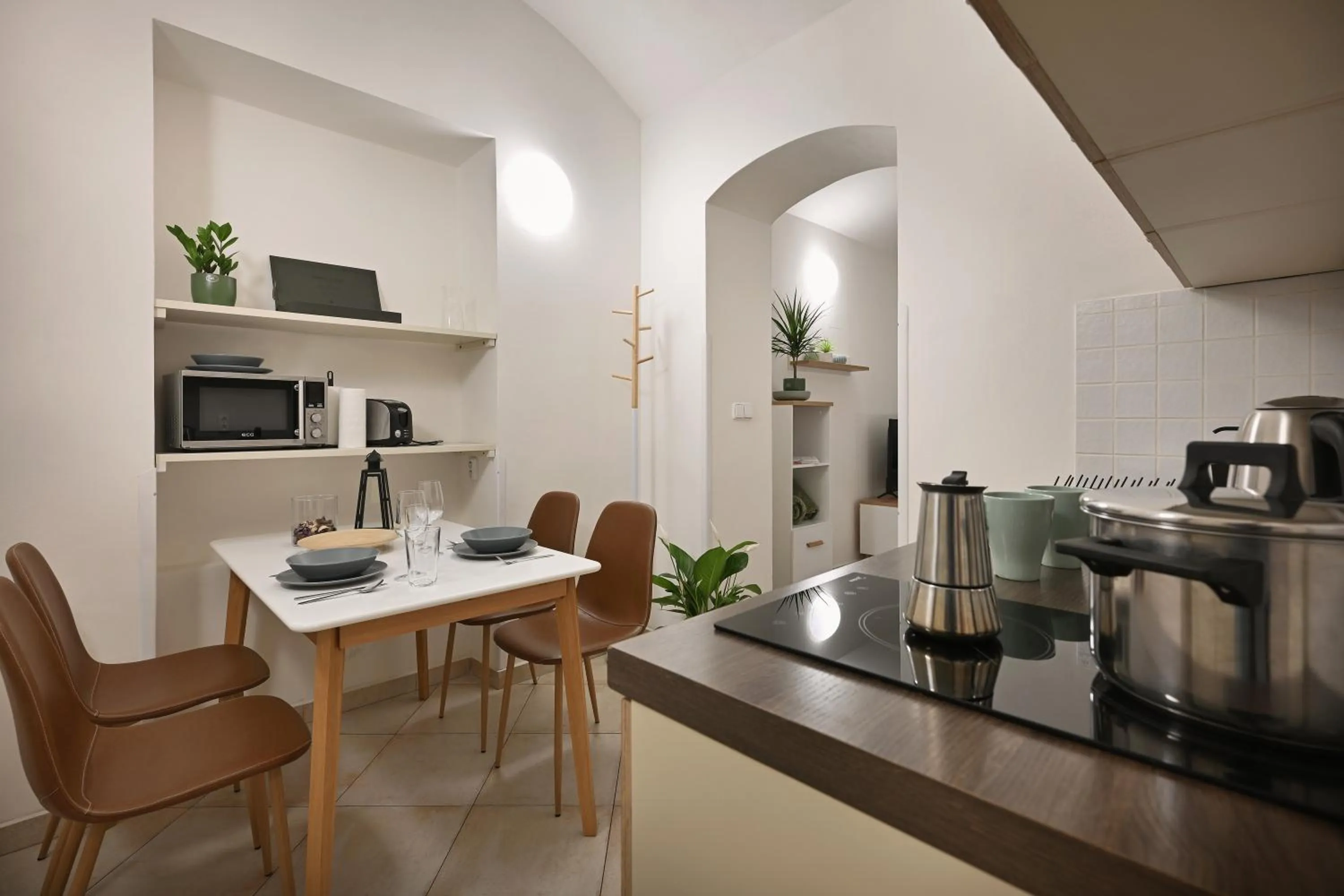Kitchen or kitchenette in White Swan Boutique Apartments