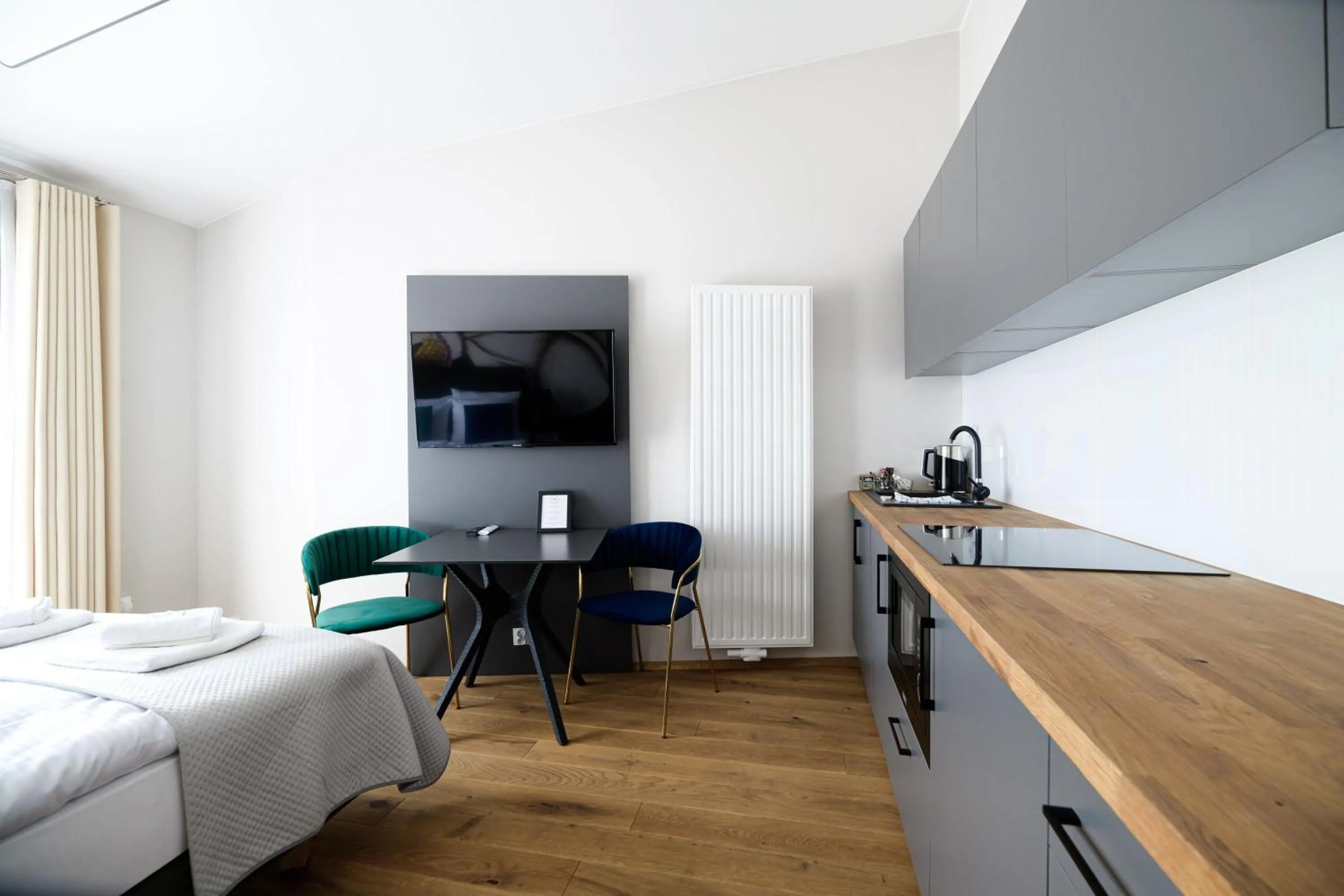 Kitchen or kitchenette, Bed in Aparthotel Inspire Miodova Residence