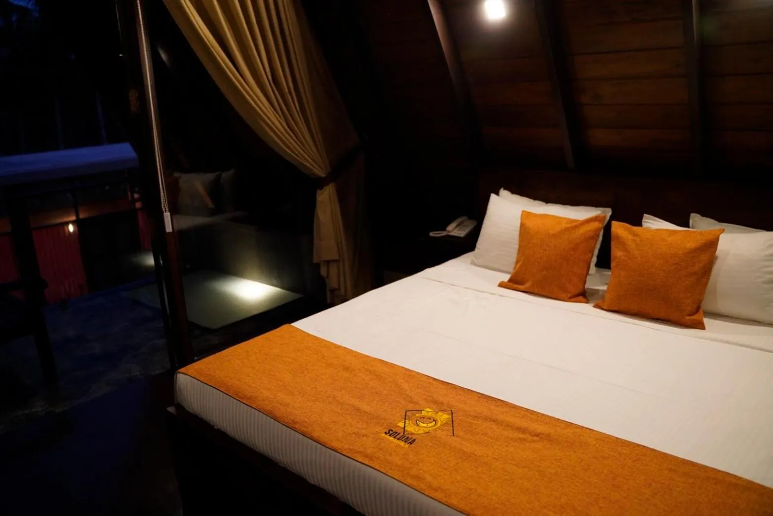 Bed in SOLUNA BEACH RESORT