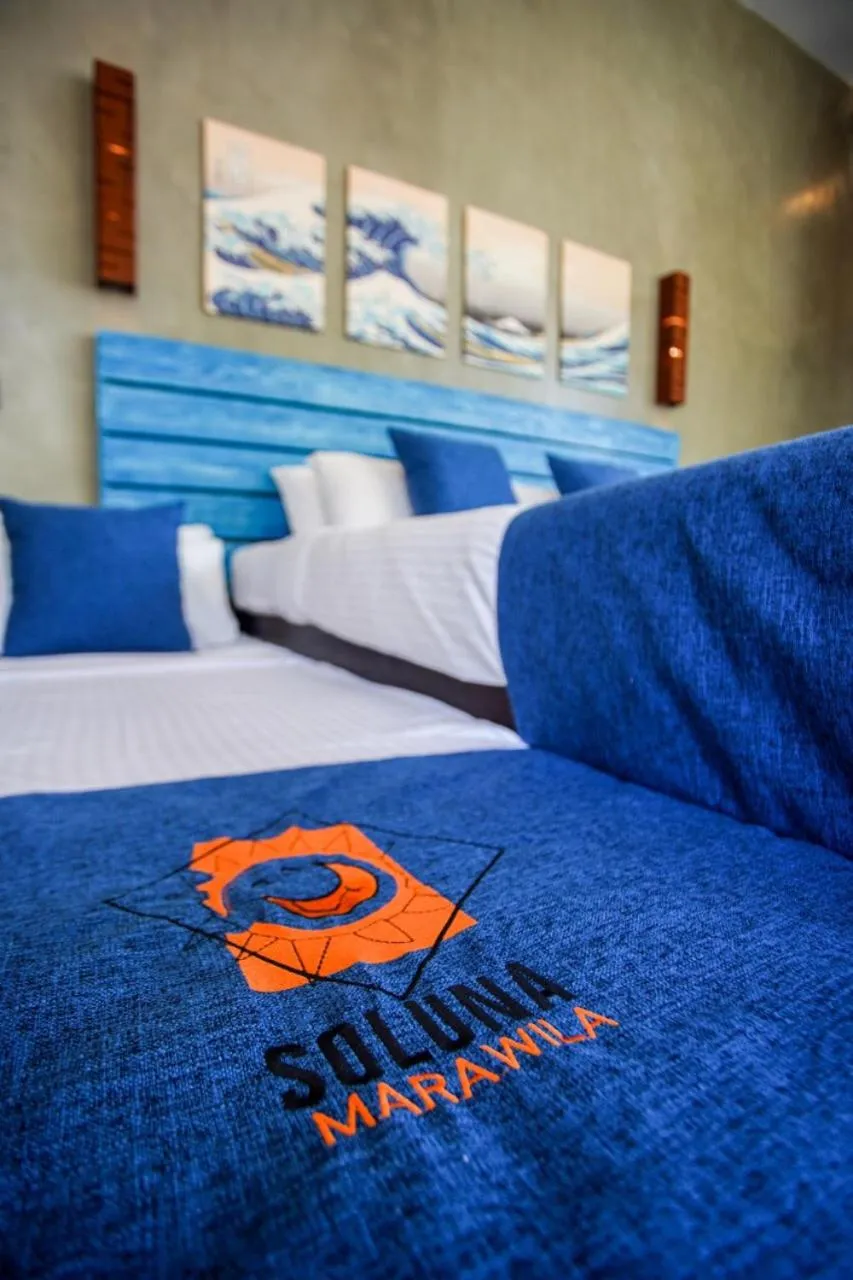 Bed in SOLUNA BEACH RESORT