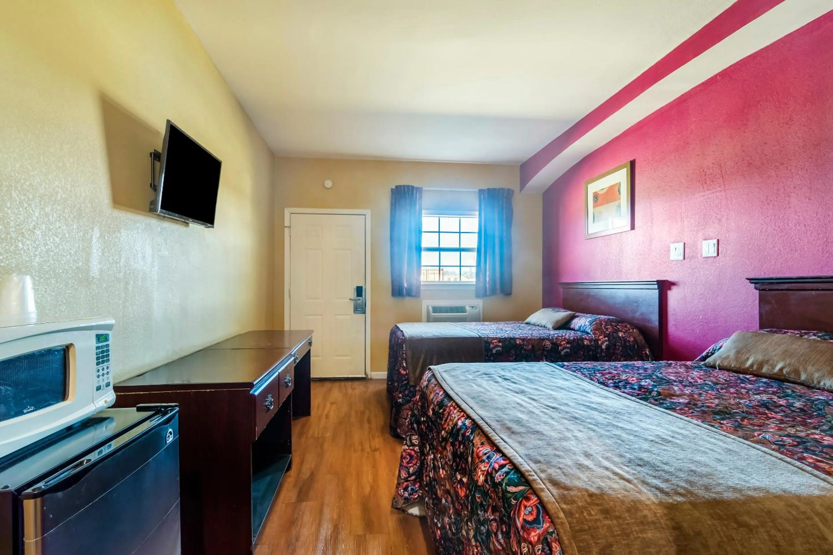 Bedroom, Bed in Ruleville Inn By OYO