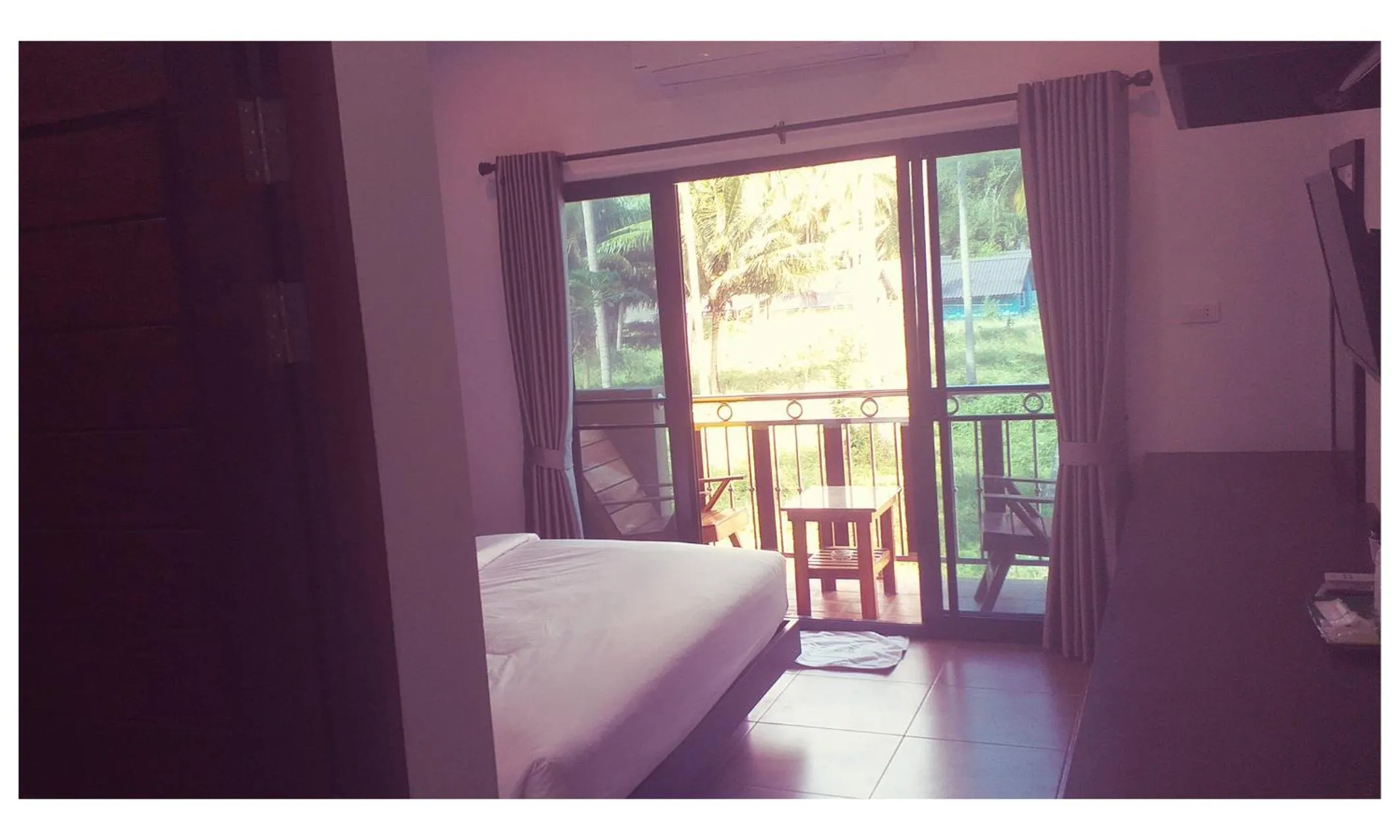 Balcony/Terrace, Bed in TAWAN RESORT