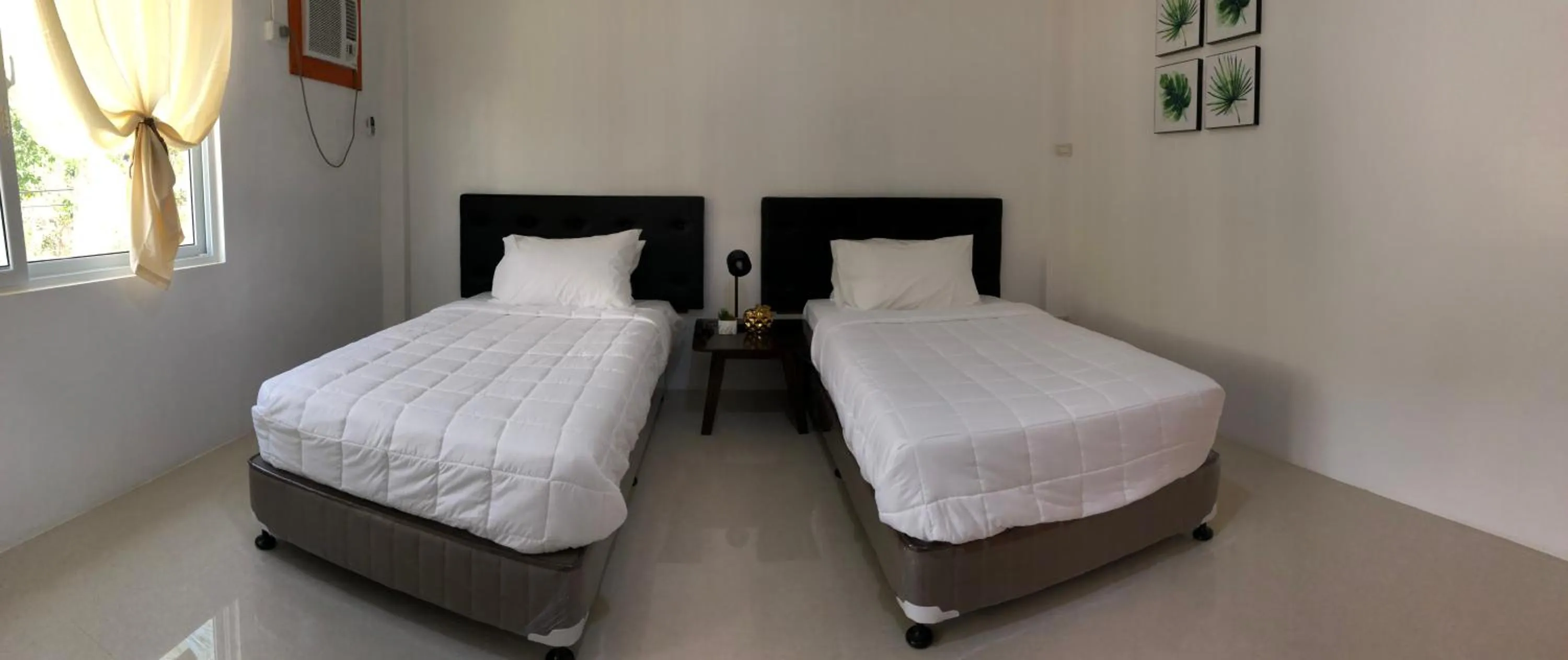 Bed in Arriyus Apartelle