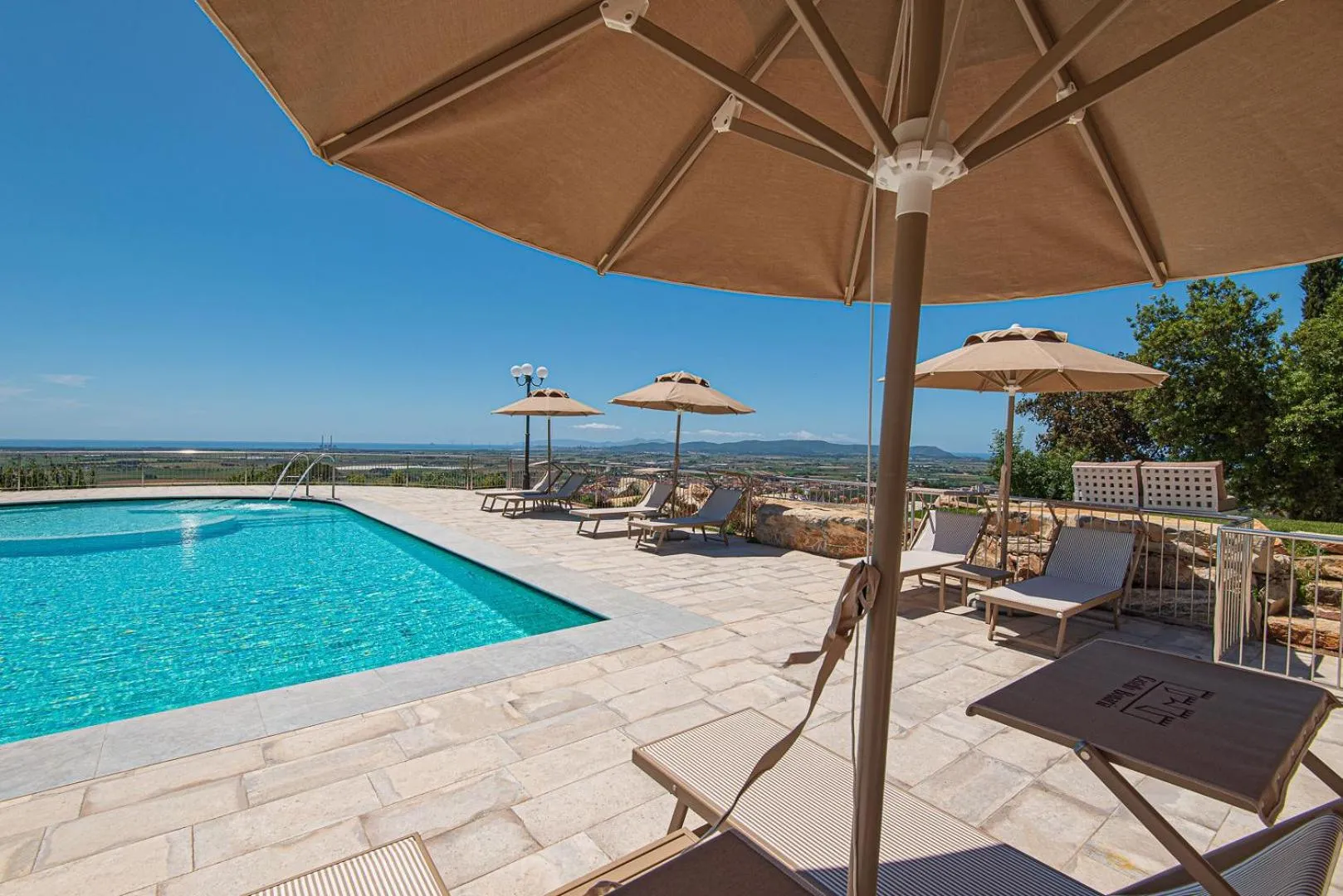 Swimming pool in Castello Bonaria Wine & Spa Resort