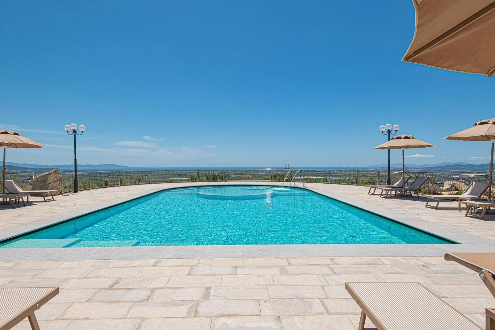 Swimming pool in Castello Bonaria Wine & Spa Resort