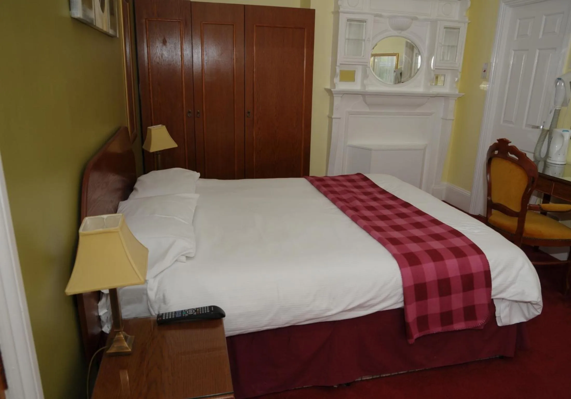 Bedroom in Wimblehurst Hotel