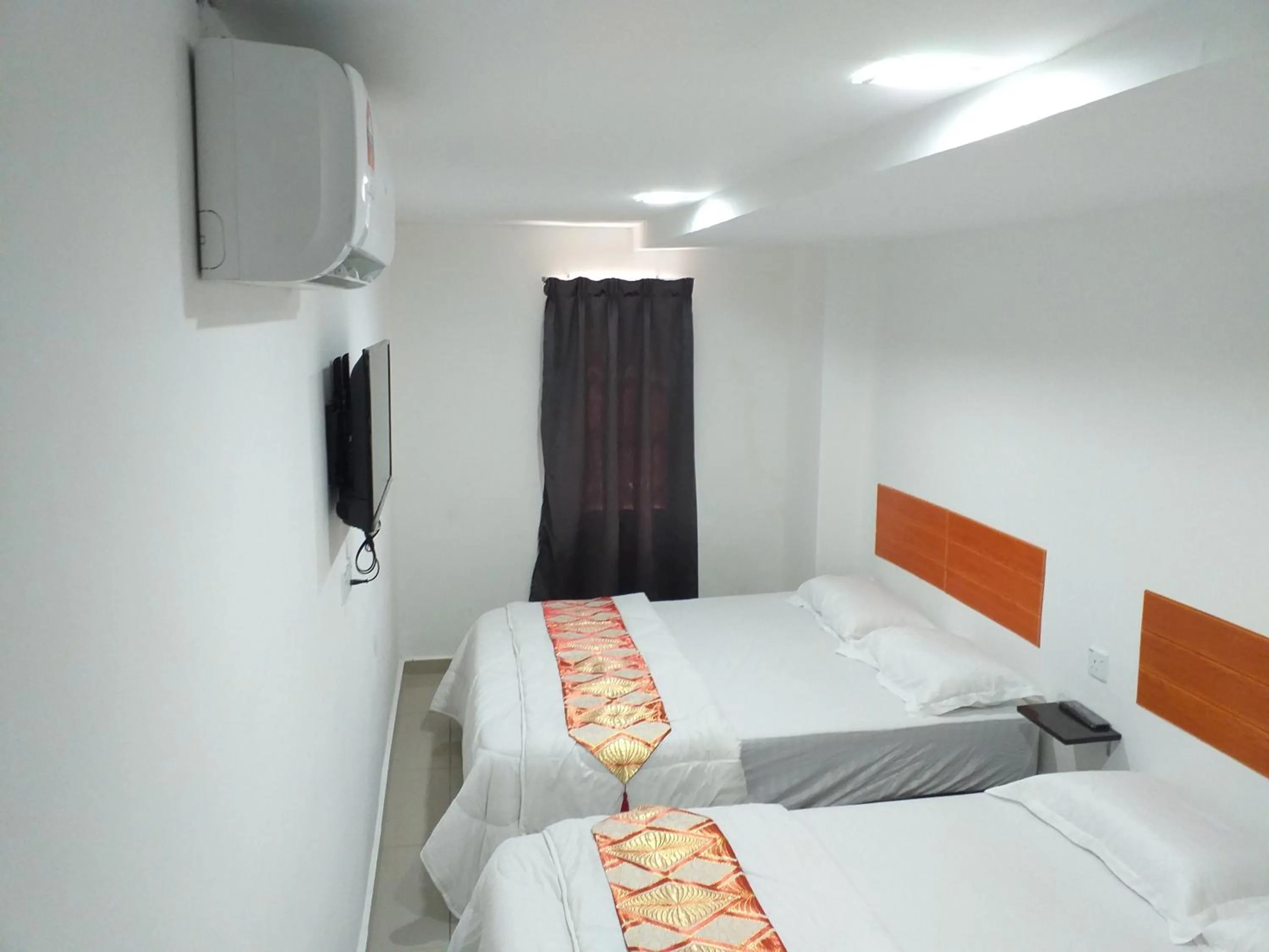 Bed in Orange Villa Hotel Near Palm Mall Seremban
