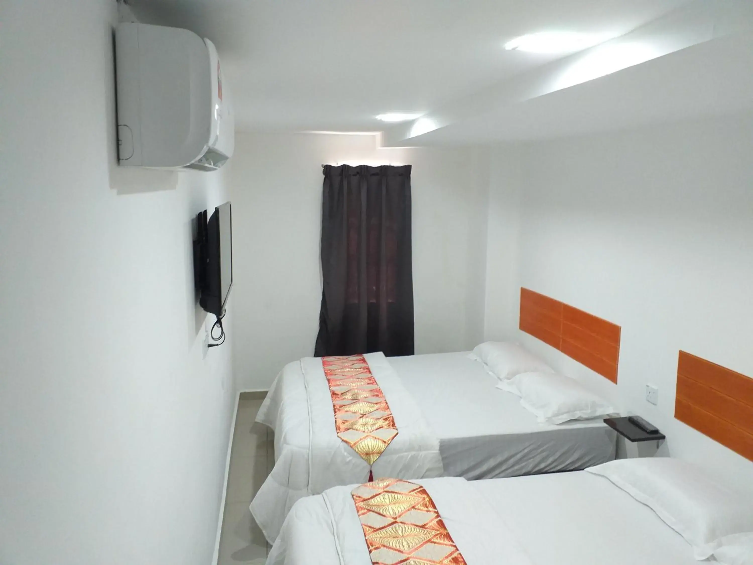 Bed in Orange Villa Hotel Near Palm Mall Seremban Bed in Orange Villa Hotel Near Palm Mall Seremban