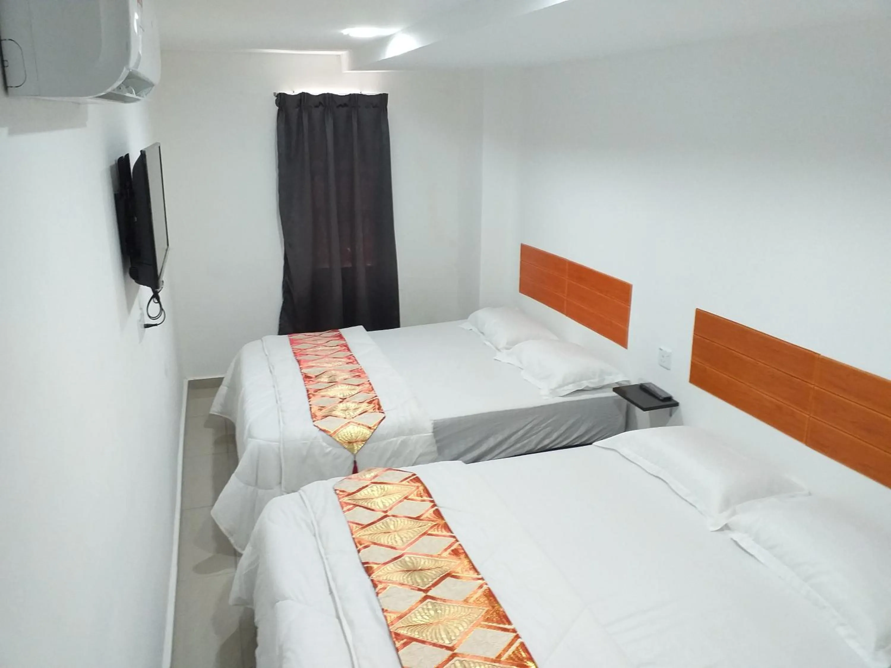 Bed in Orange Villa Hotel Near Palm Mall Seremban