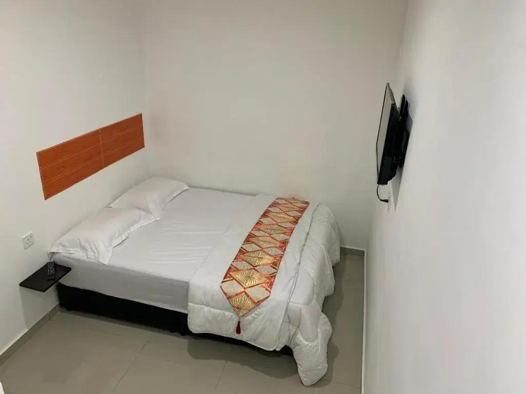 Bed in Orange Villa Hotel Near Palm Mall Seremban Bed in Orange Villa Hotel Near Palm Mall Seremban