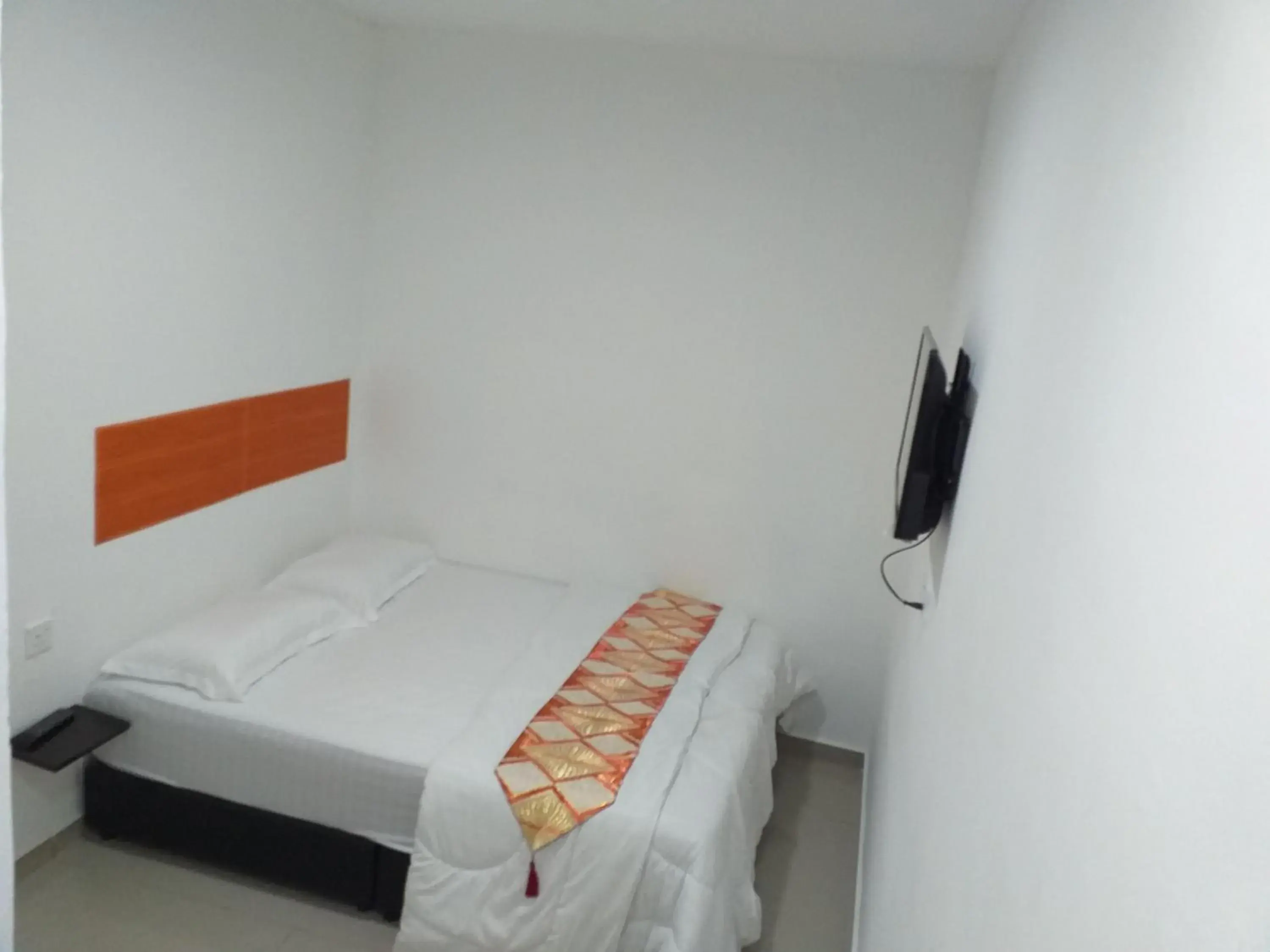 Bed in Orange Villa Hotel Near Palm Mall Seremban Bed in Orange Villa Hotel Near Palm Mall Seremban