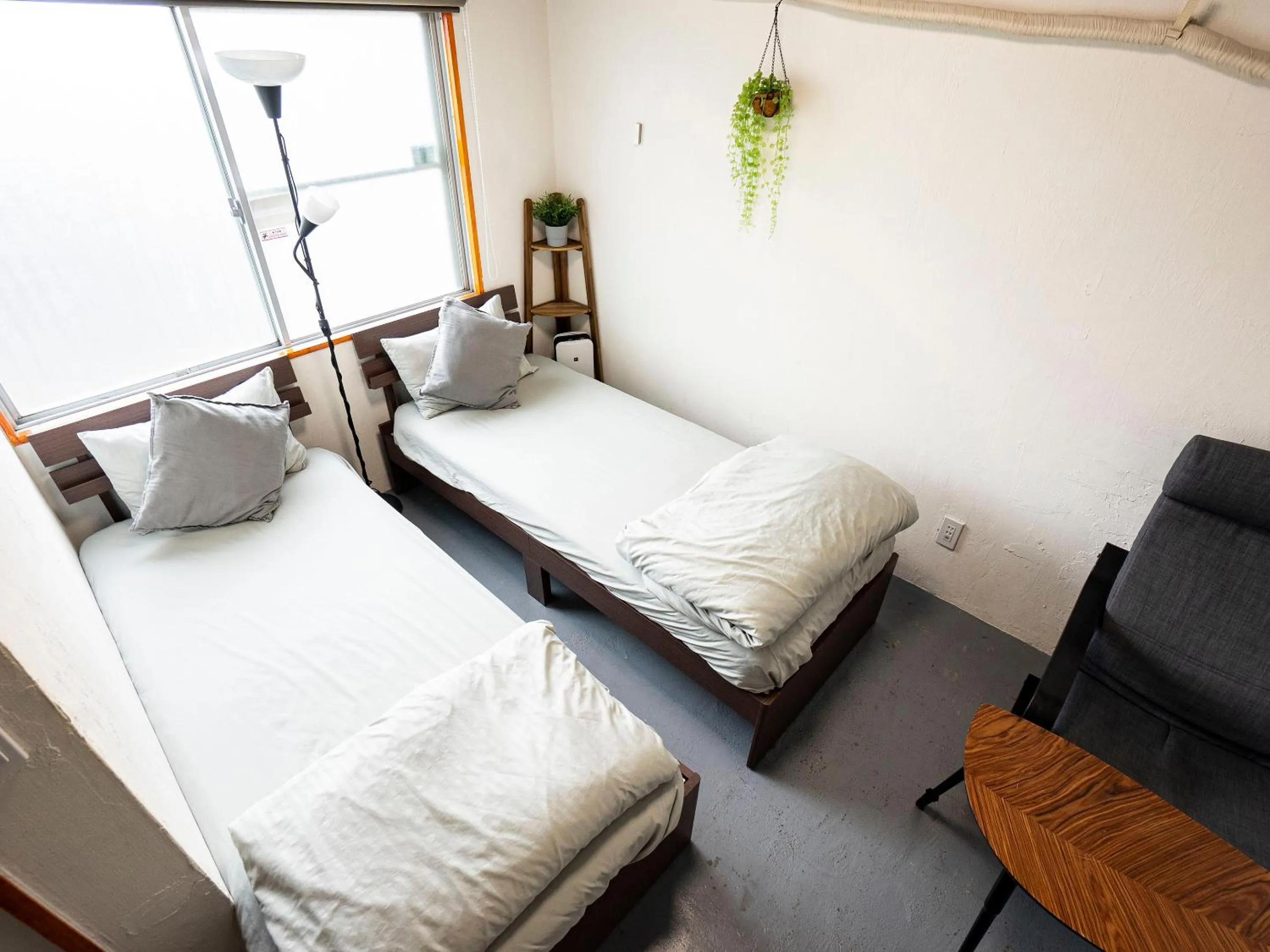 Bed in WE HOME HOTEL and KITCHEN 市川 船橋