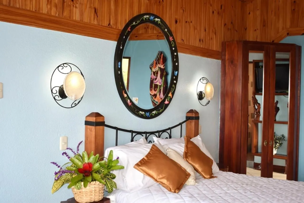 Bed in Guayabo Lodge