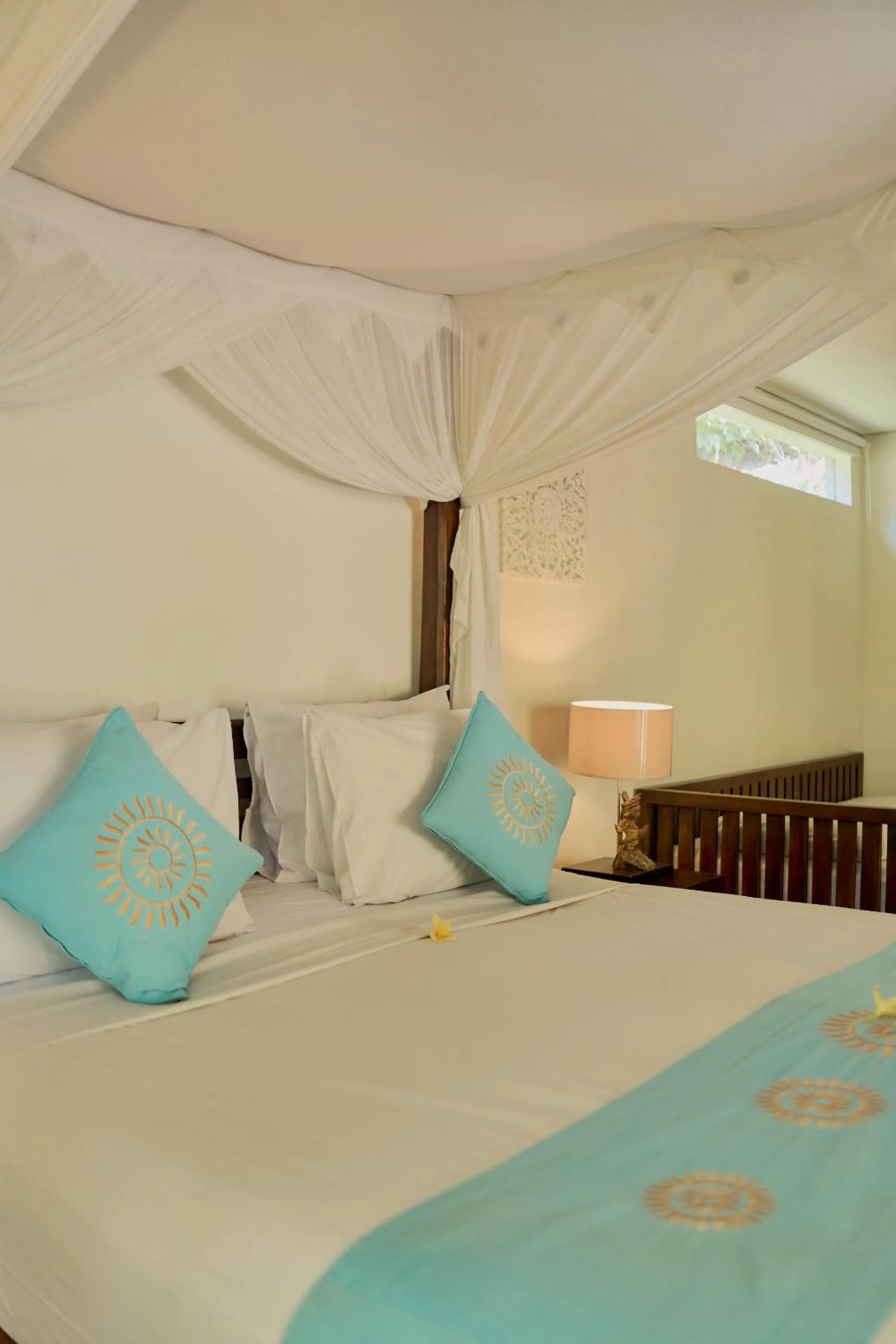 Bed in Sama's Cottages and Villas