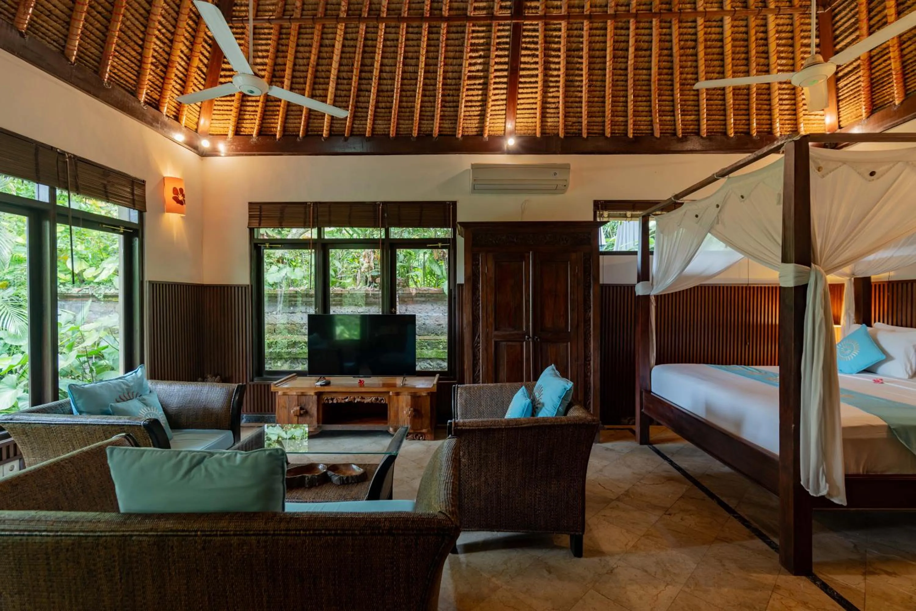 Bed in Sama's Cottages and Villas
