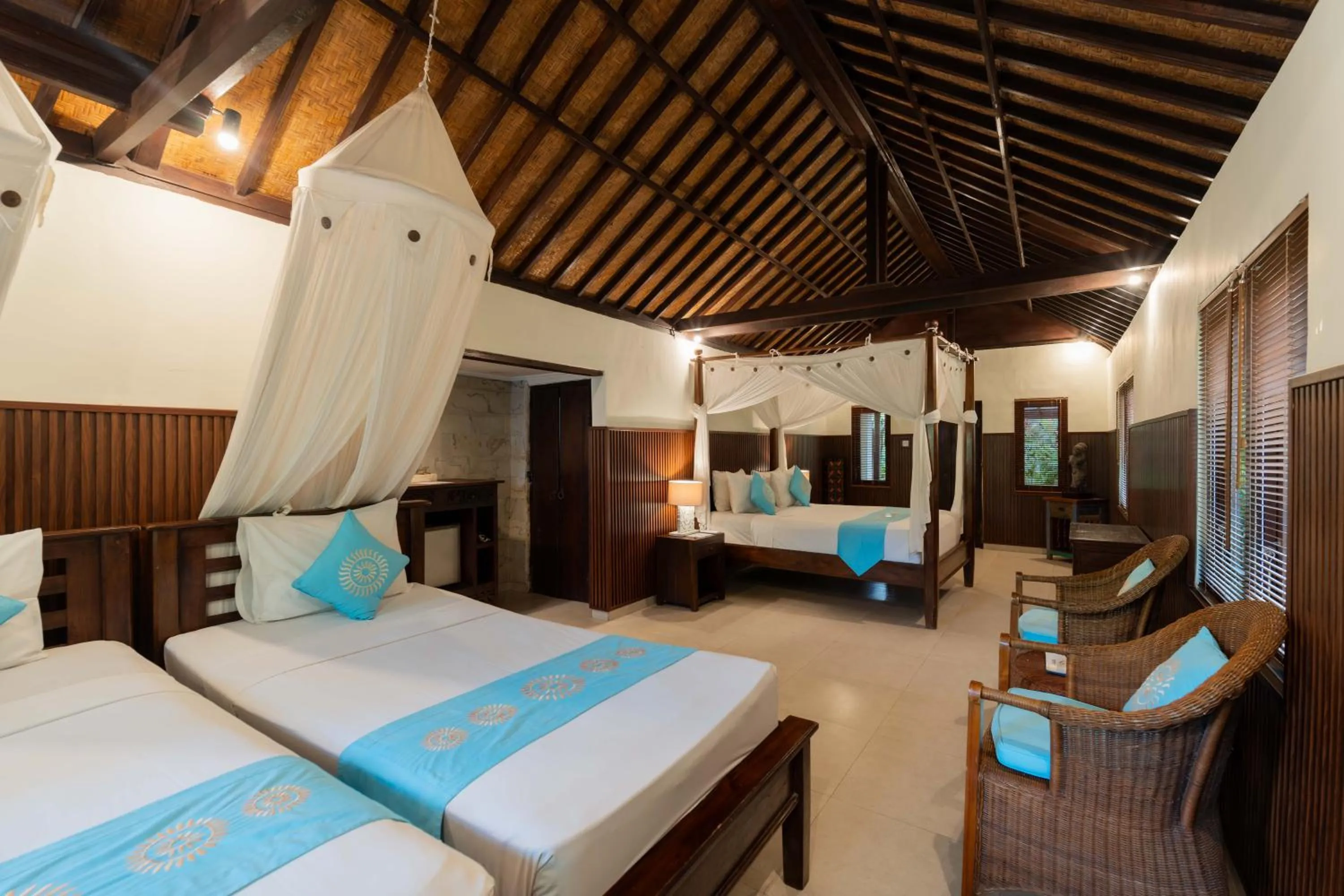 Bed in Sama's Cottages and Villas