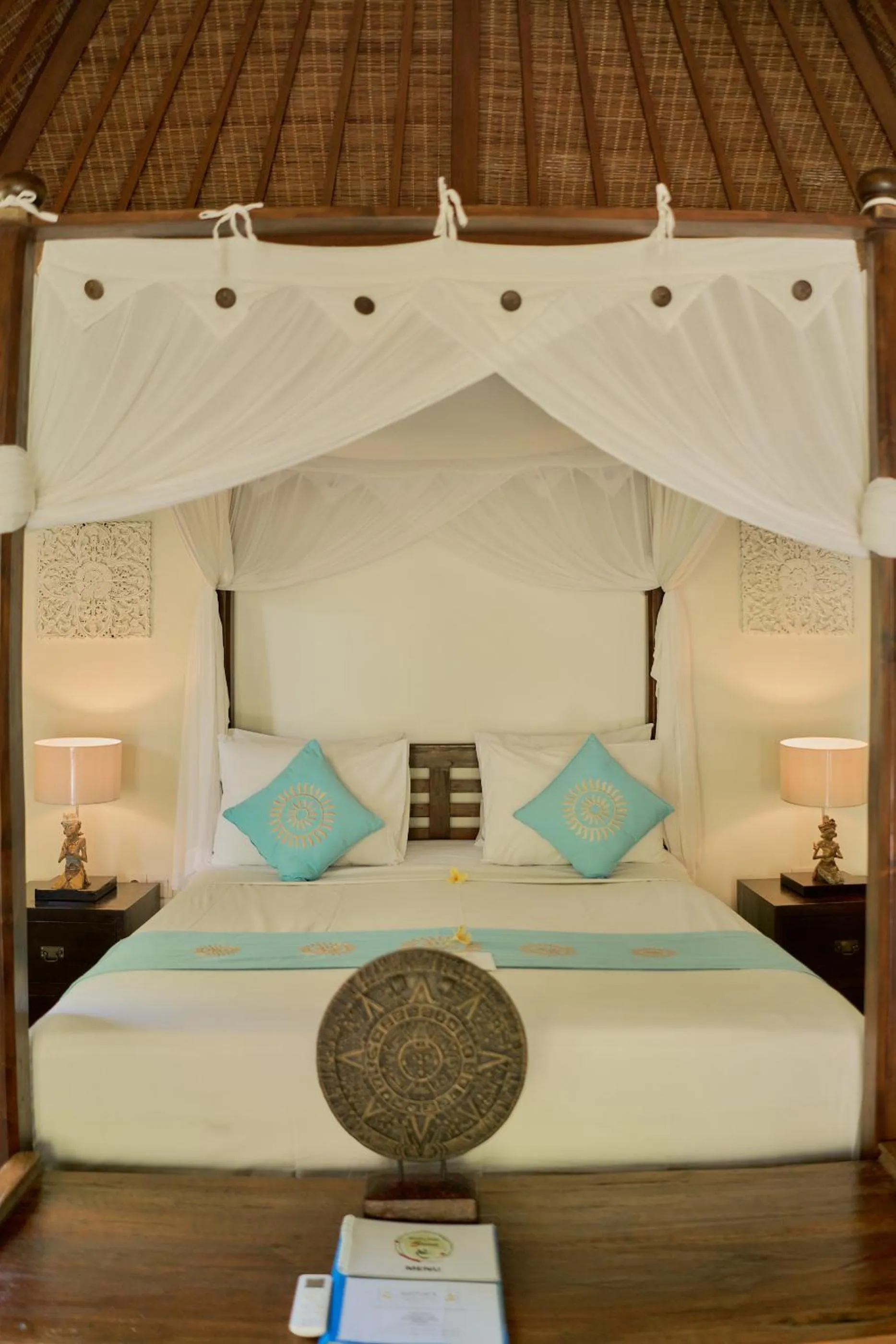 Bed in Sama's Cottages and Villas