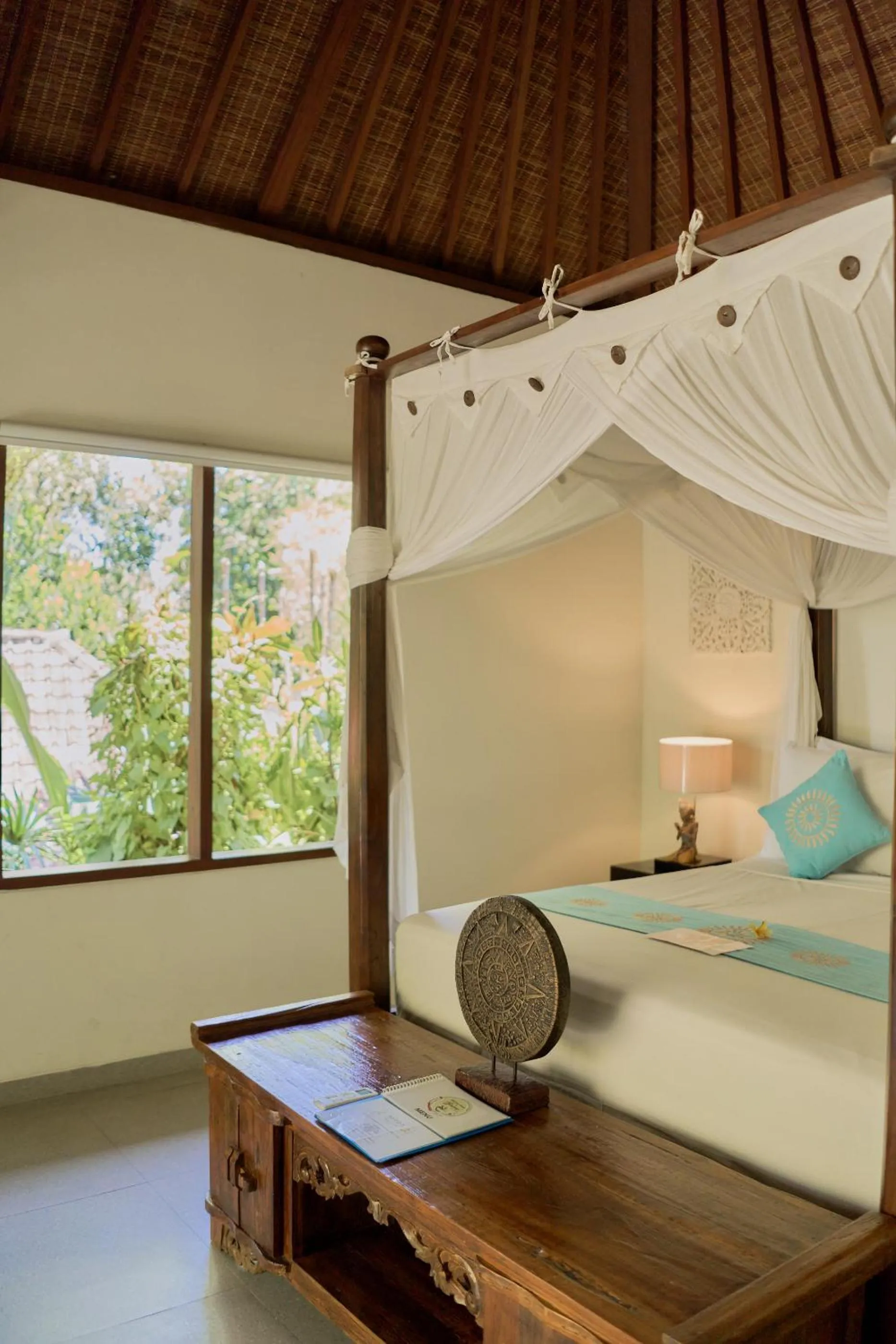 Bed in Sama's Cottages and Villas