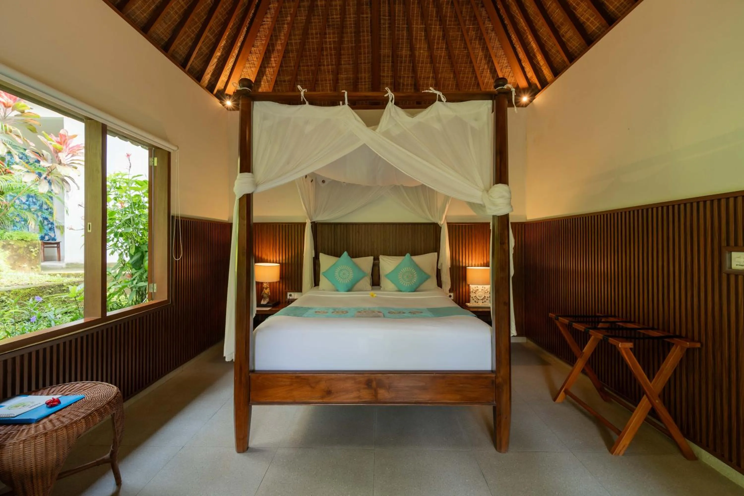 Bed in Sama's Cottages and Villas