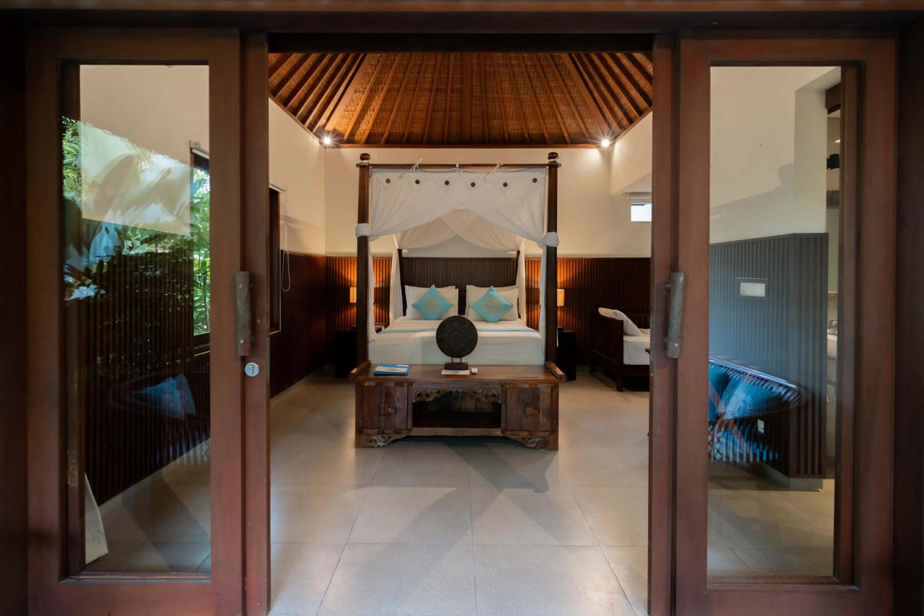 Bed in Sama's Cottages and Villas